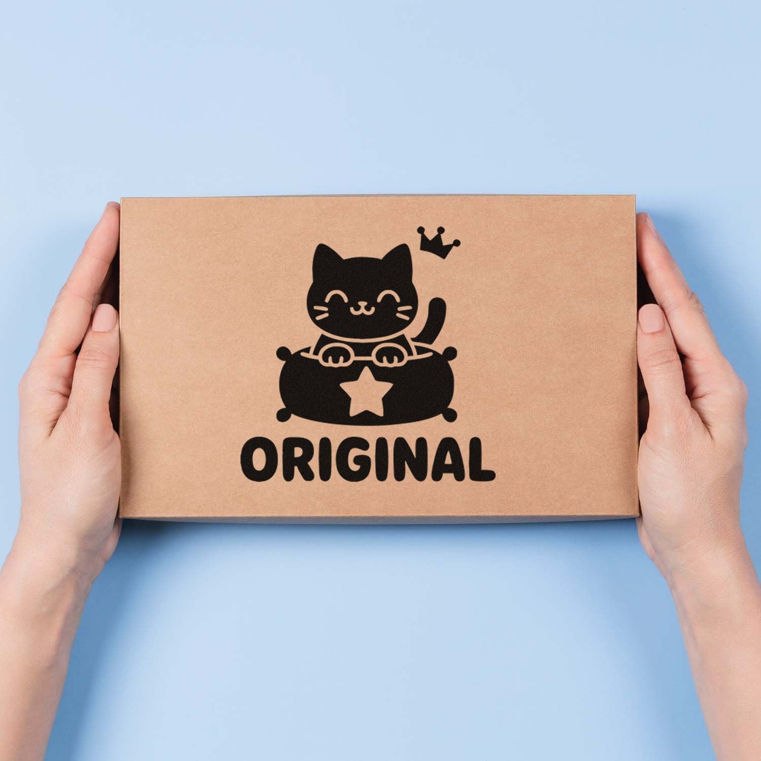 Brown kraft box with black cat stamp seal and ORIGINAL text, held by hands on a light blue background.