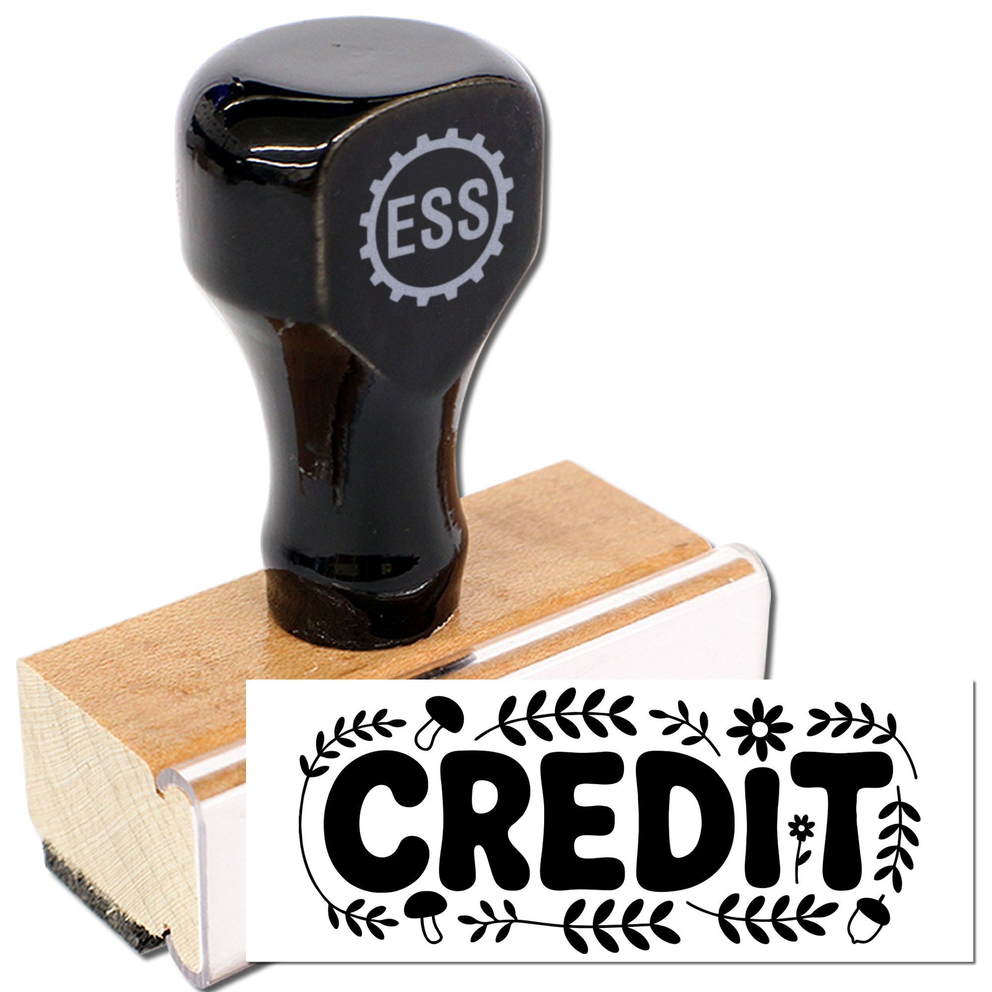 Black wooden stamp and seal with ESS logo and CREDIT floral design on white background