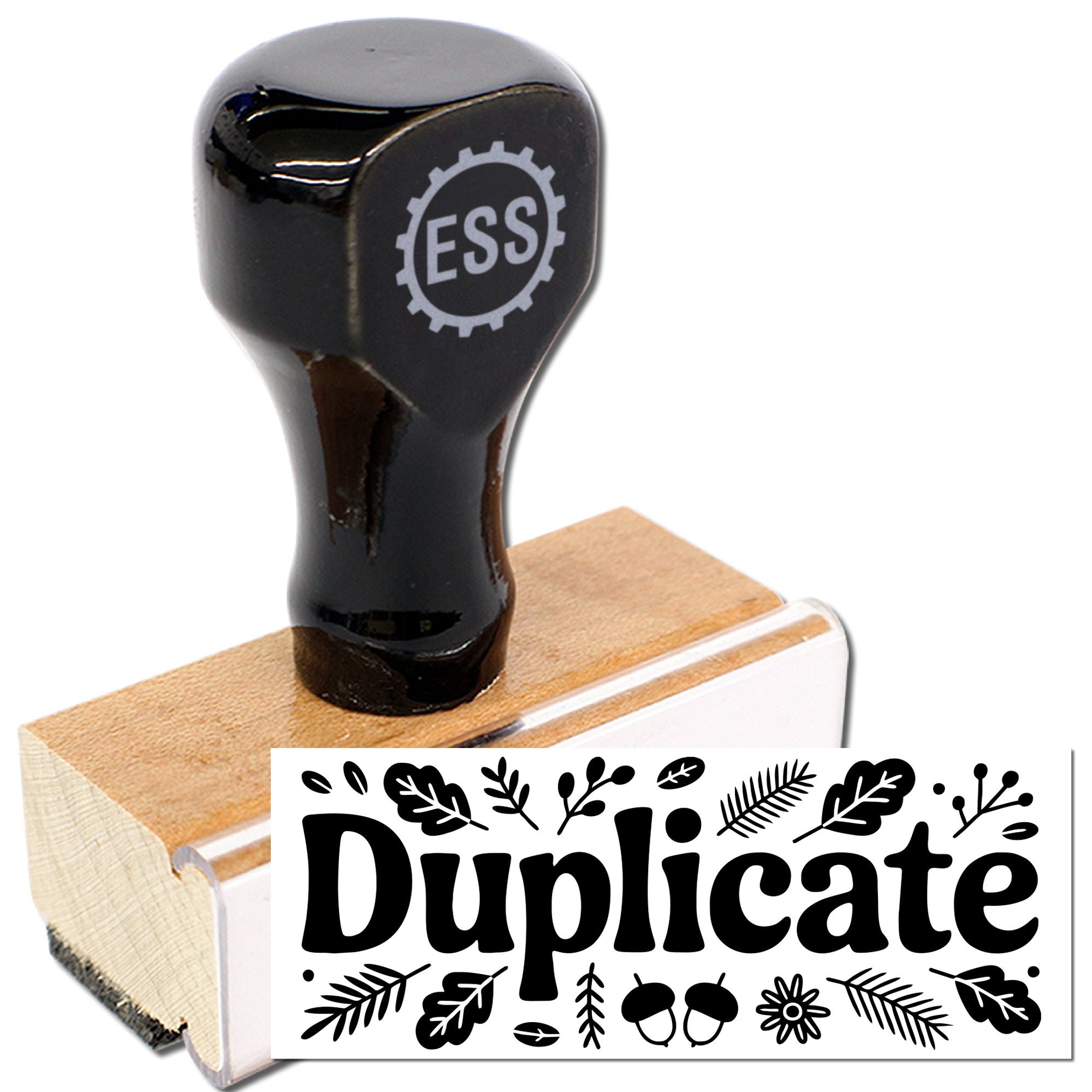 Black seal stamp on tan wooden block, showing ESS logo and a white Duplicate design with leaf motifs.
