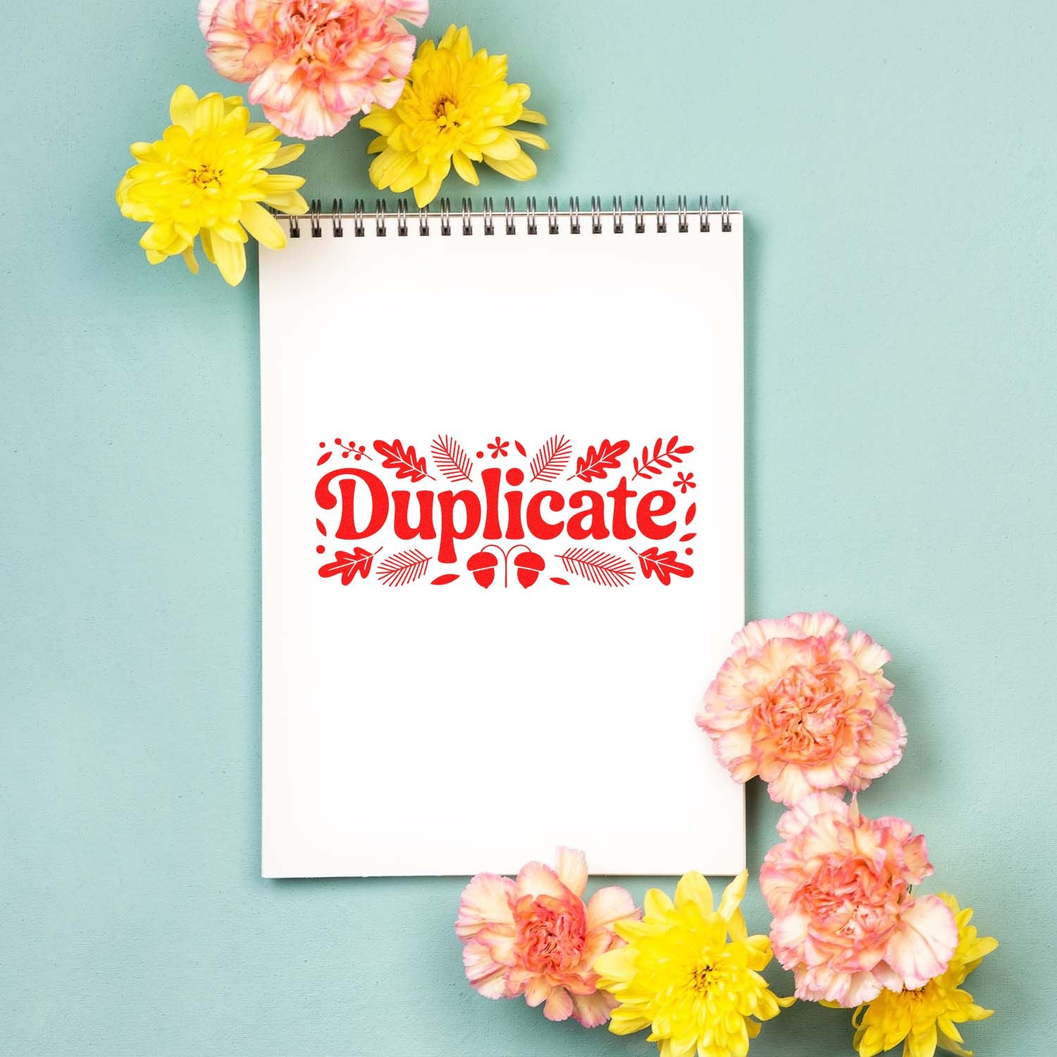 Decorative red Duplicate! stamp seal on white spiral notebook, surrounded by yellow and pink flowers on mint background.