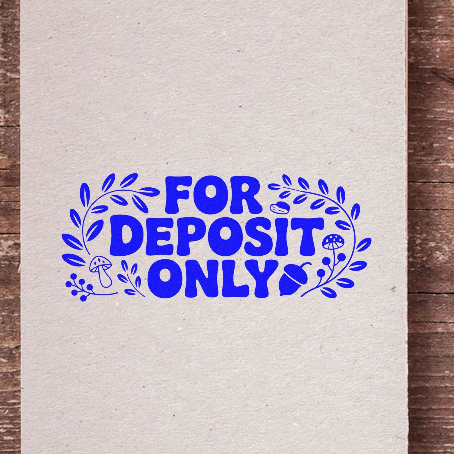 Blue FOR DEPOSIT ONLY stamp seal with leafy wreath, mushrooms, on cream paper