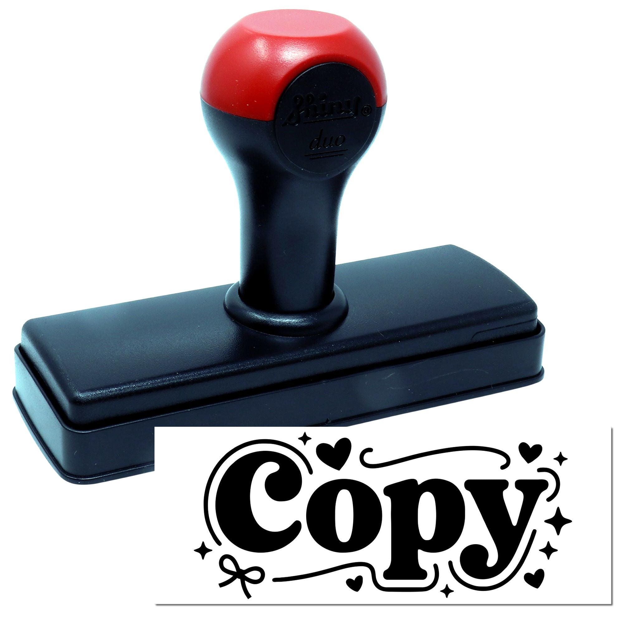 Red-and-black self-inking stamp and seal with rectangular base and decorative black Copy imprint on white.