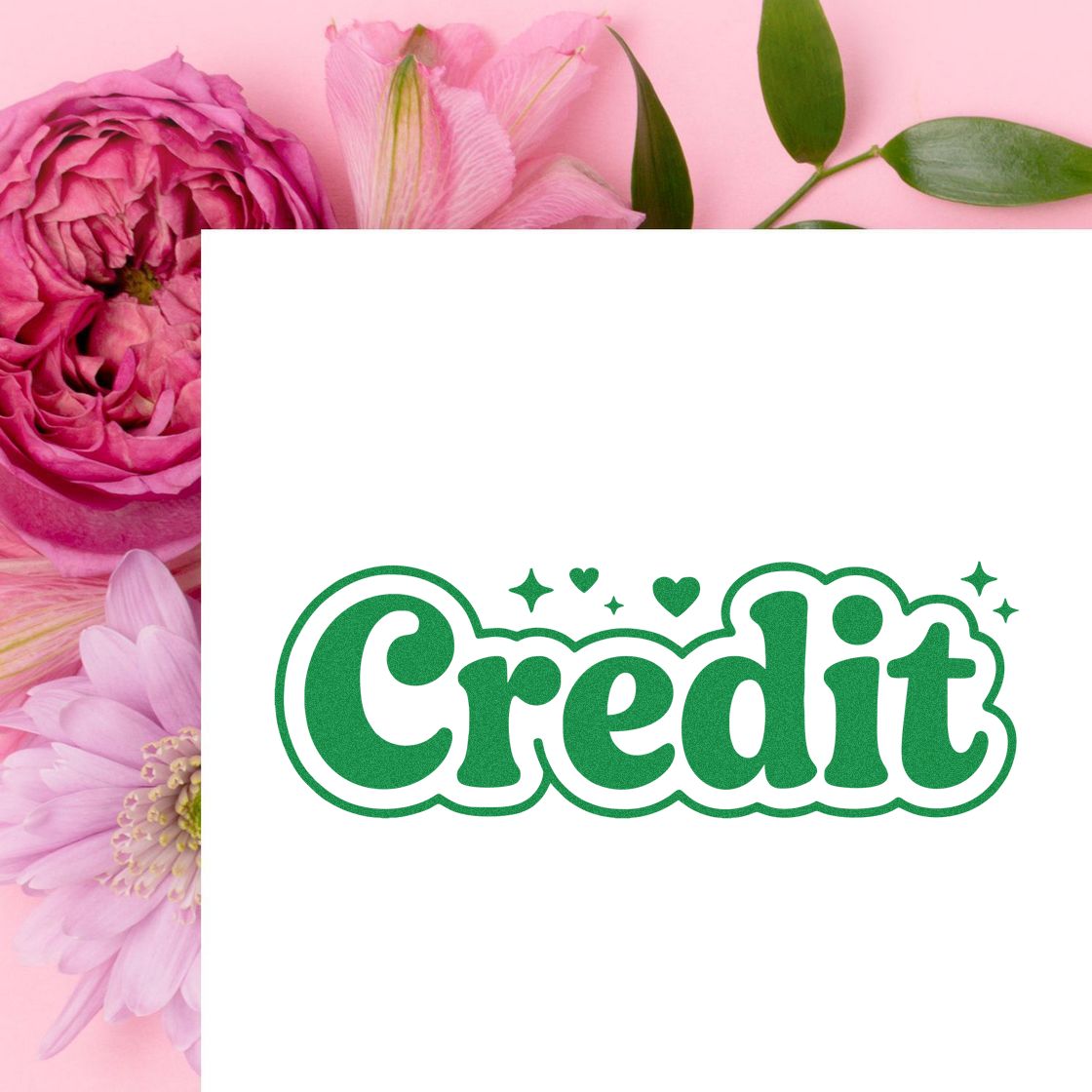 Green Credit stamp and seal with hearts on a white card against a pink floral background.