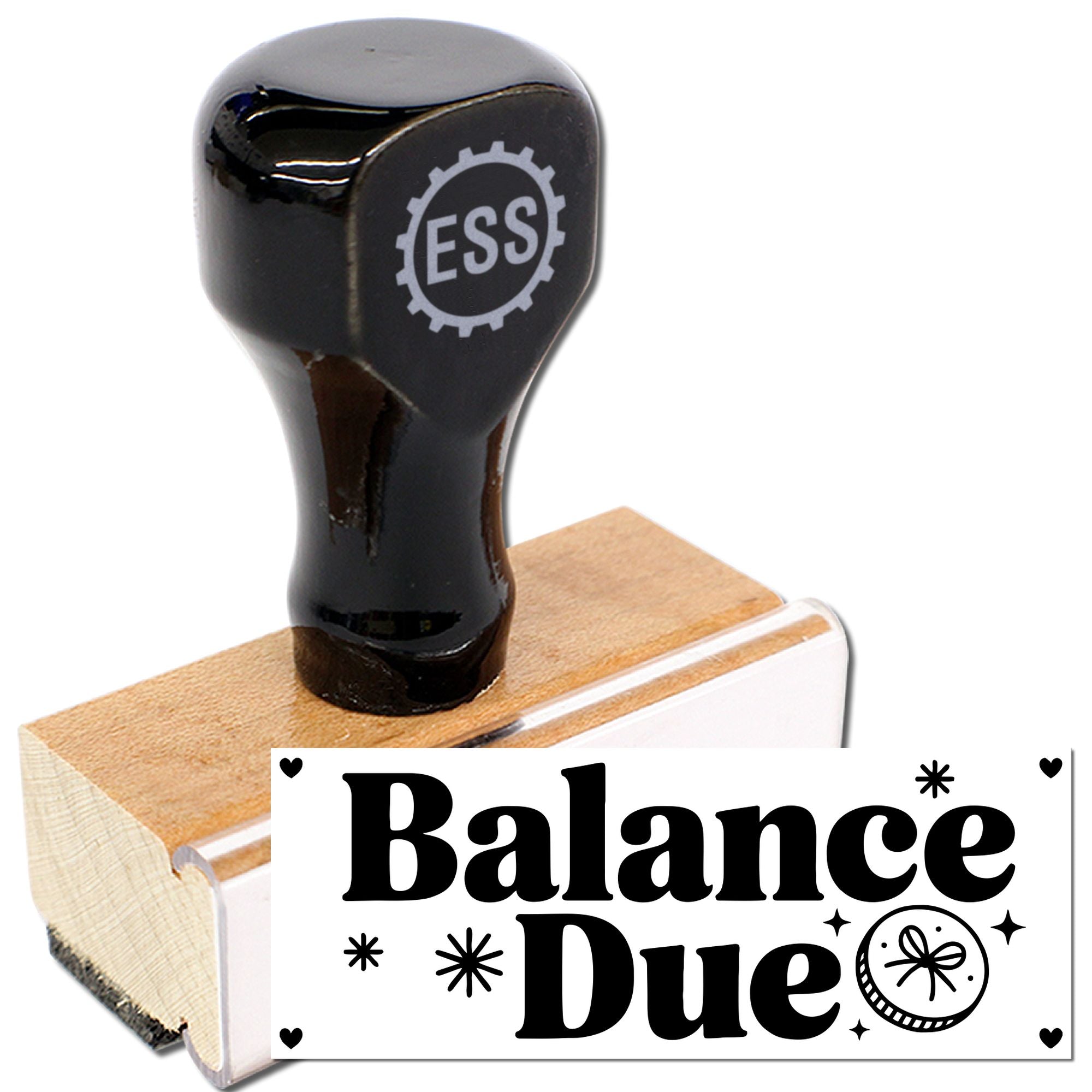Black ESS stamp on wooden block with white Balance Due seal design and decorative hearts