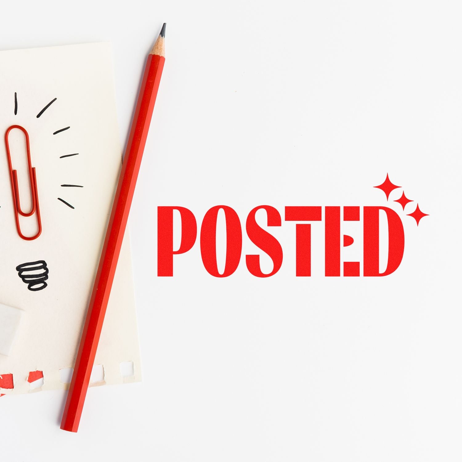 Red POSTED stamp seal with sparkles, beside a red pencil and paper clip on white paper.