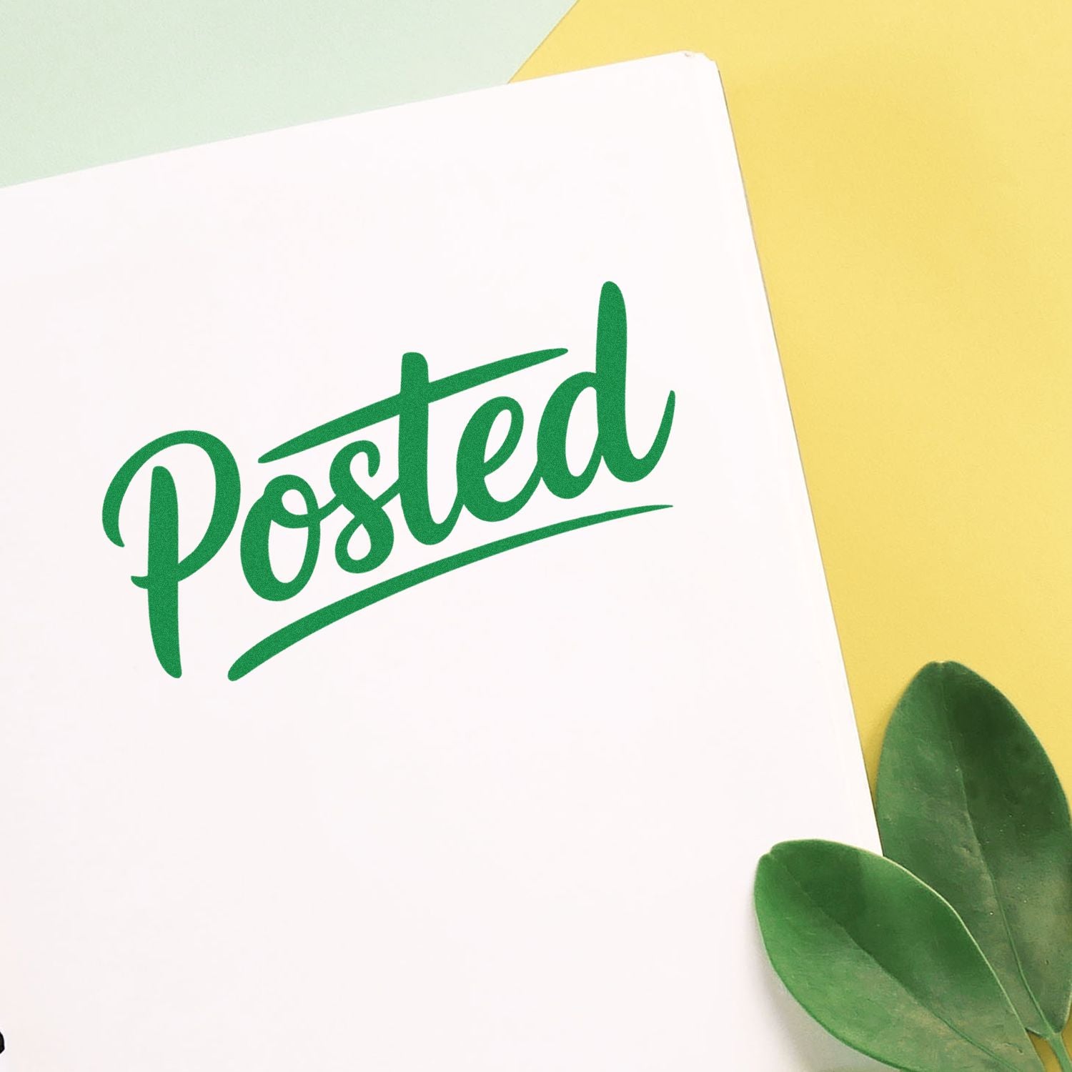 Green Posted stamp seal on white paper with yellow background and green leaves.