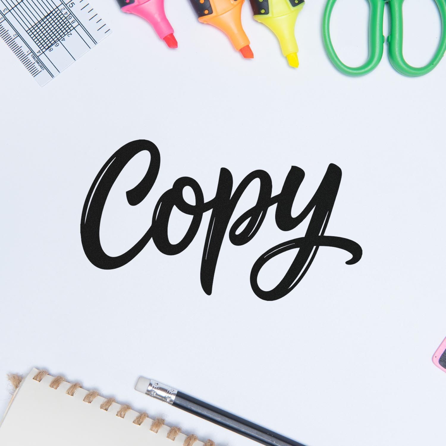 Black Copy stamp and seal design on white background, framed by colorful markers, scissors, ruler, and brush.