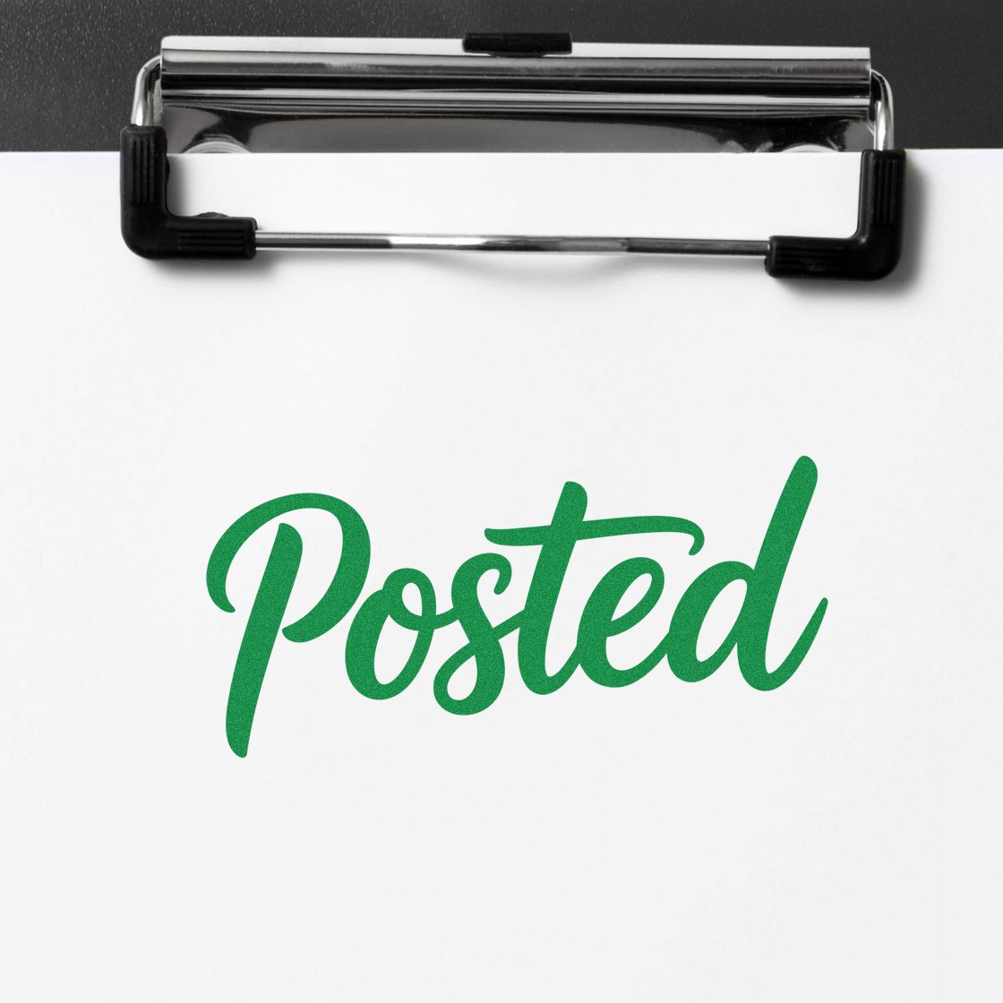 Chrome clipboard with white paper and green Posted stamp seal