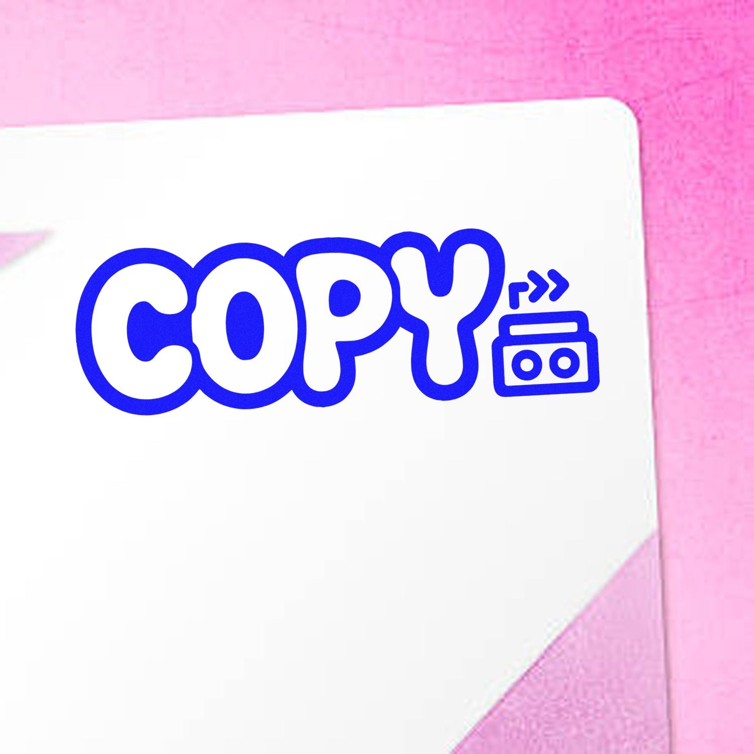 Blue COPY stamp and seal graphic with cassette icon on white paper against a pink background.