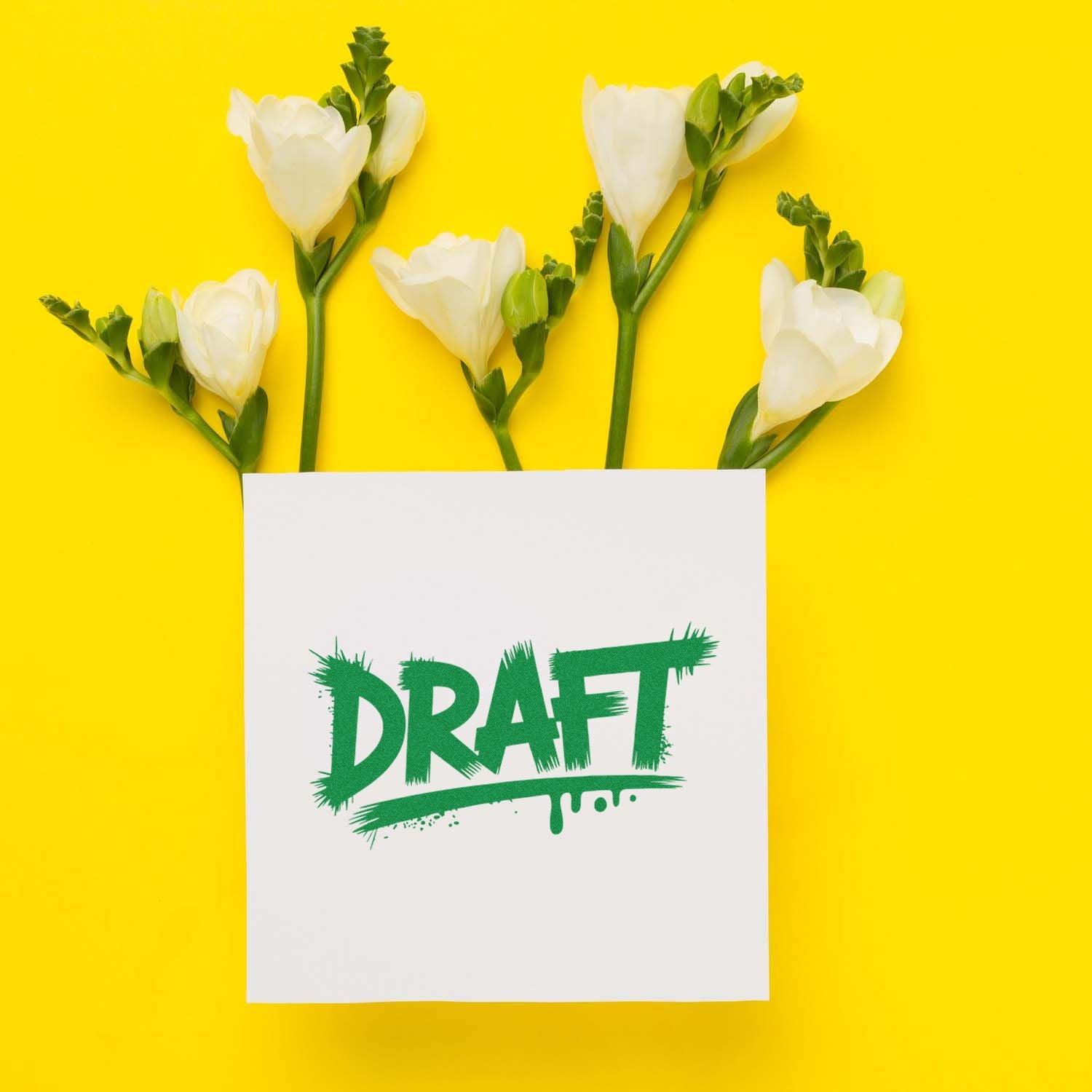 Green DRAFT stamp seal on white paper, framed by white flowers with green stems on a bright yellow background.