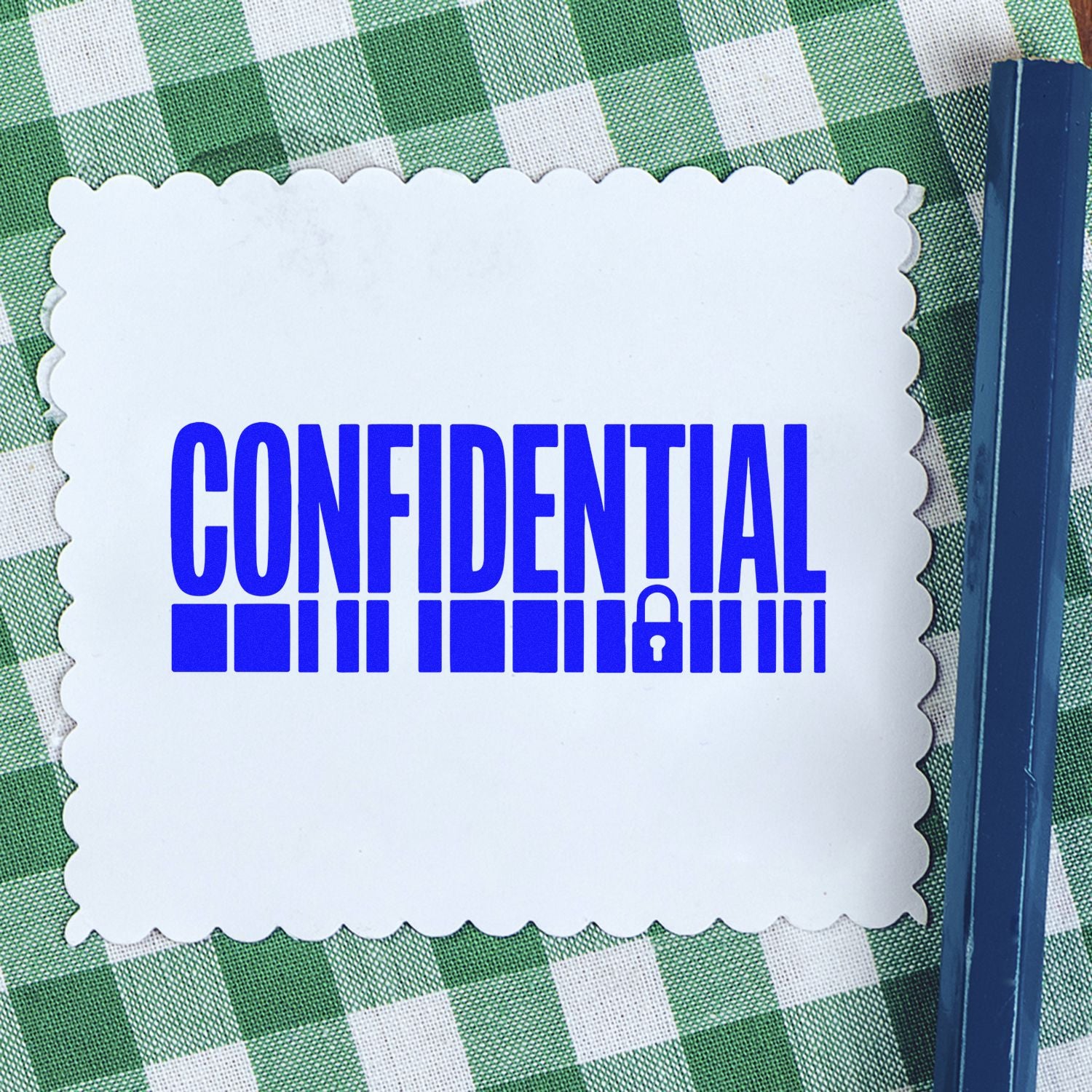 White scalloped confidentiality seal stamp with bold blue CONFIDENTIAL and lock icon on green checkered background.