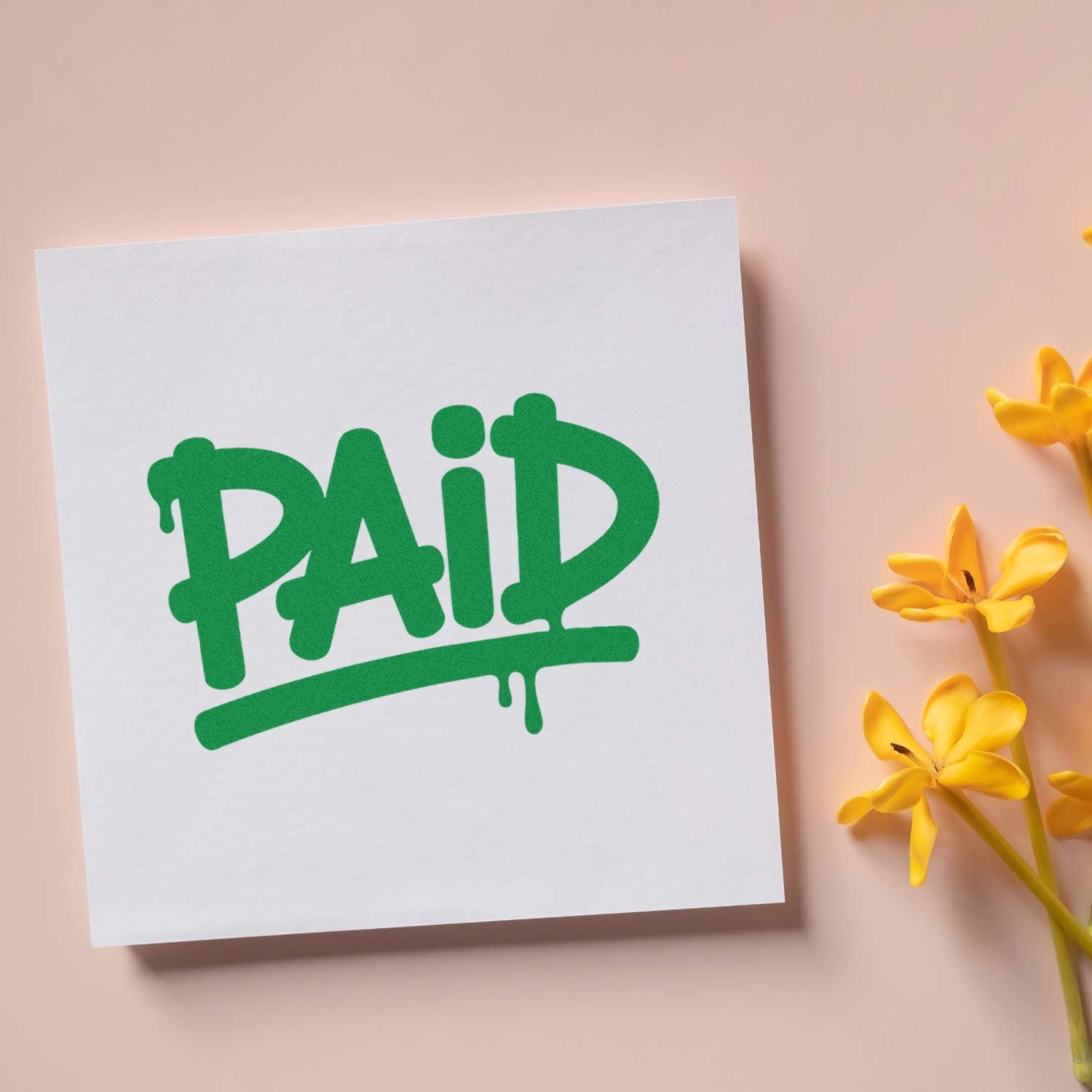 Green PAID stamp seal on white card with yellow flowers on a blush pink background.