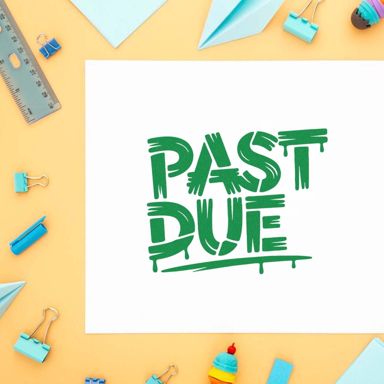 Green Past Due stamp-and-seal design on white paper, with pastel blue binder clips and ruler on a yellow background.