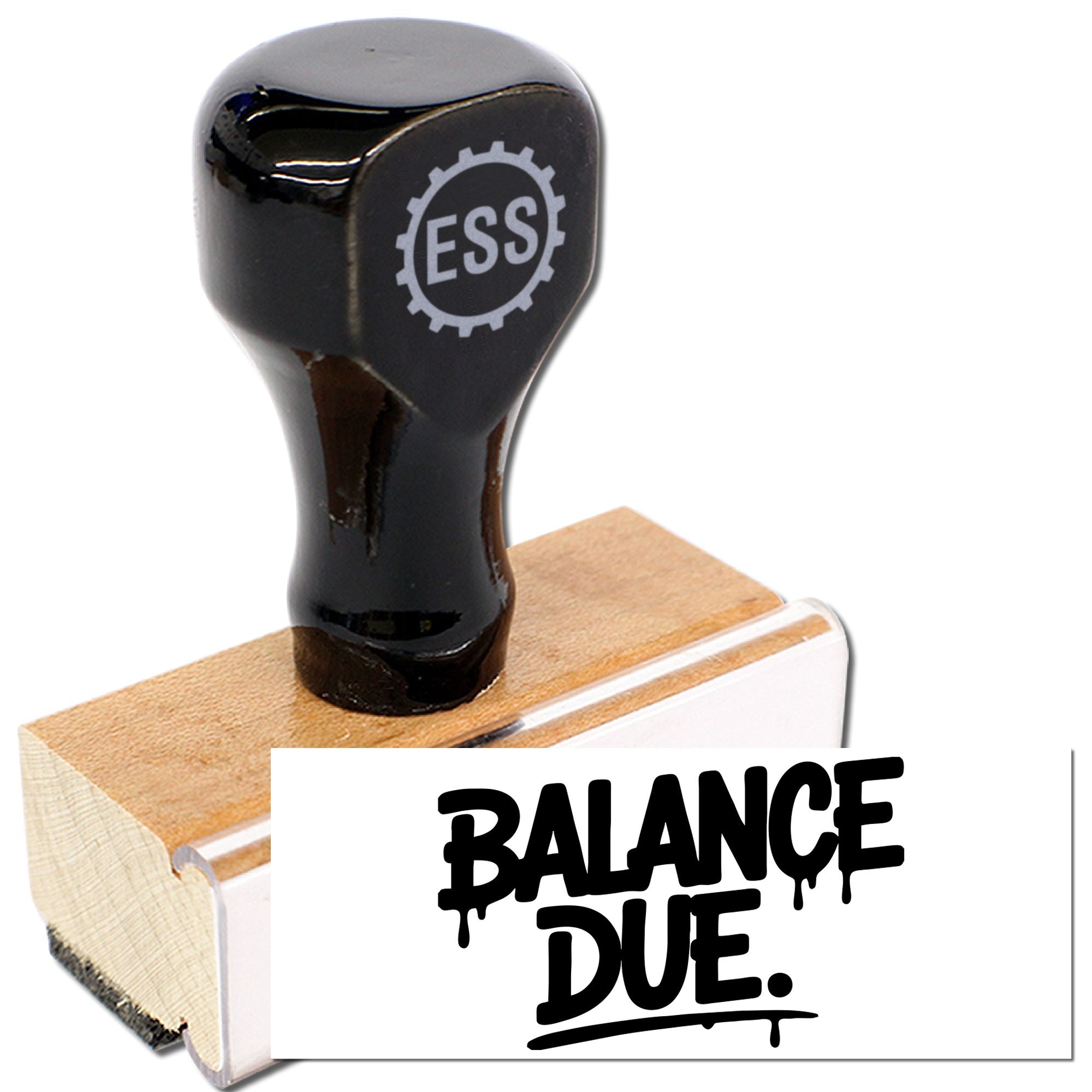 Black rubber stamp on wooden block, printing BALANCE DUE in bold black on a white seal.