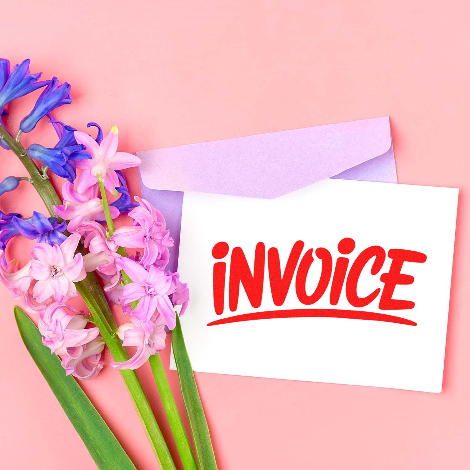 White invoice envelope with red stamp, pastel purple seal envelope, and pink-blue flowers on a pink background.