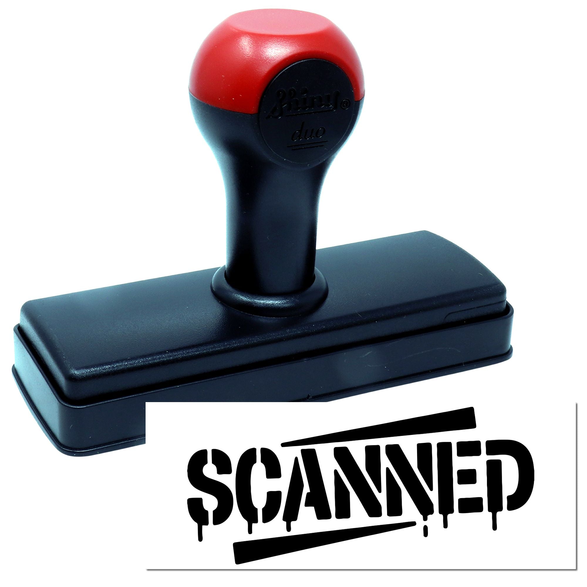 Red and black self-inking stamp with rectangular base and bold SCANNED seal impression.