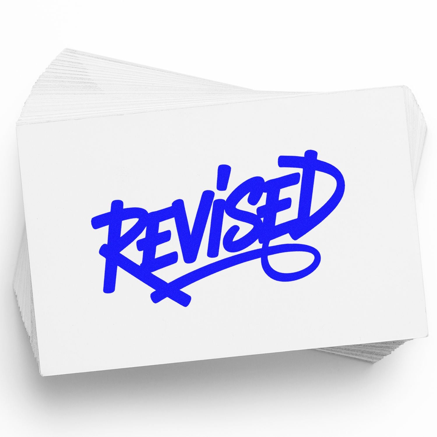 Stack of white stamp and seal cards with a bold blue REVISED rubber stamp seal