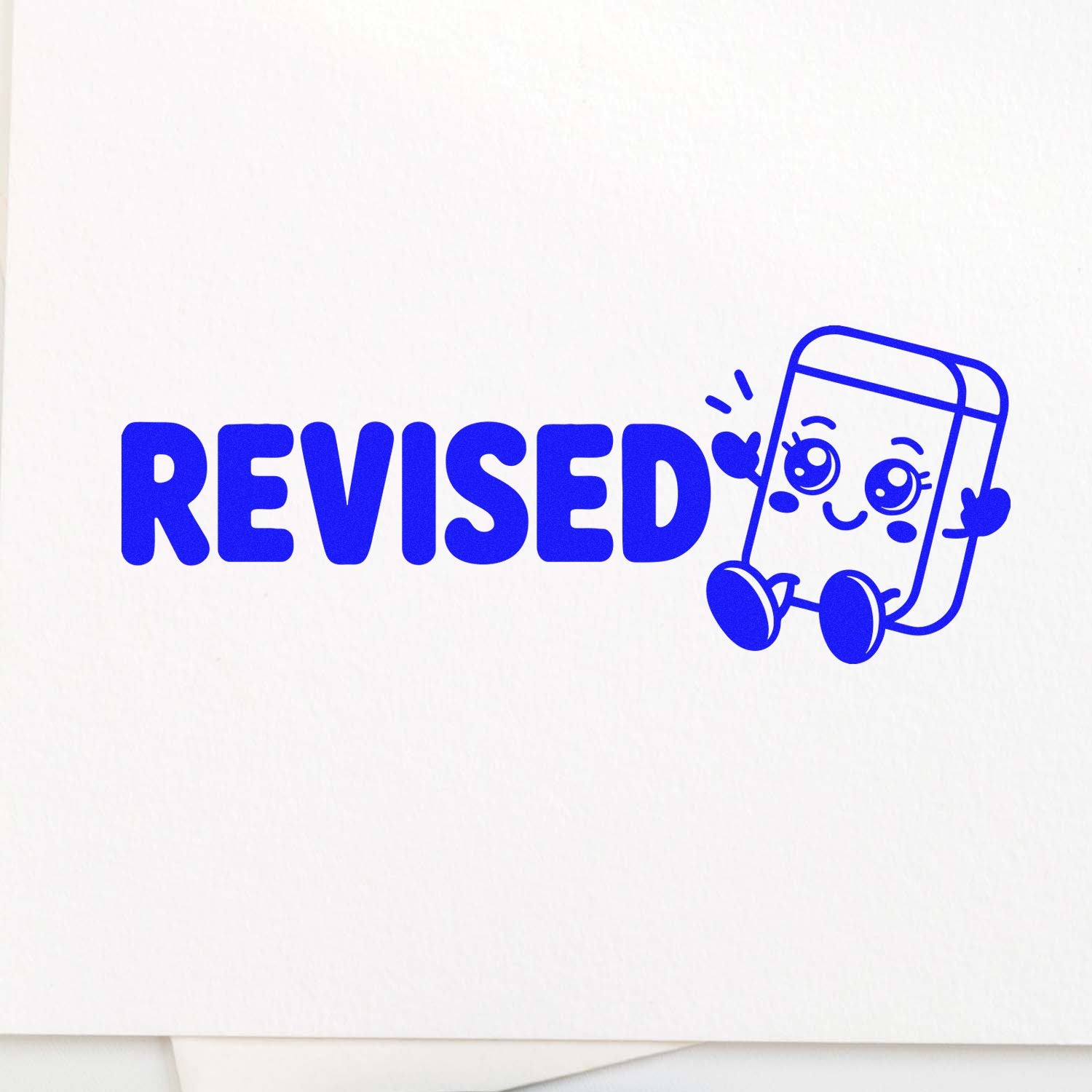 Blue REVISED stamp with smiling seal mascot and bold blue lettering on white paper.