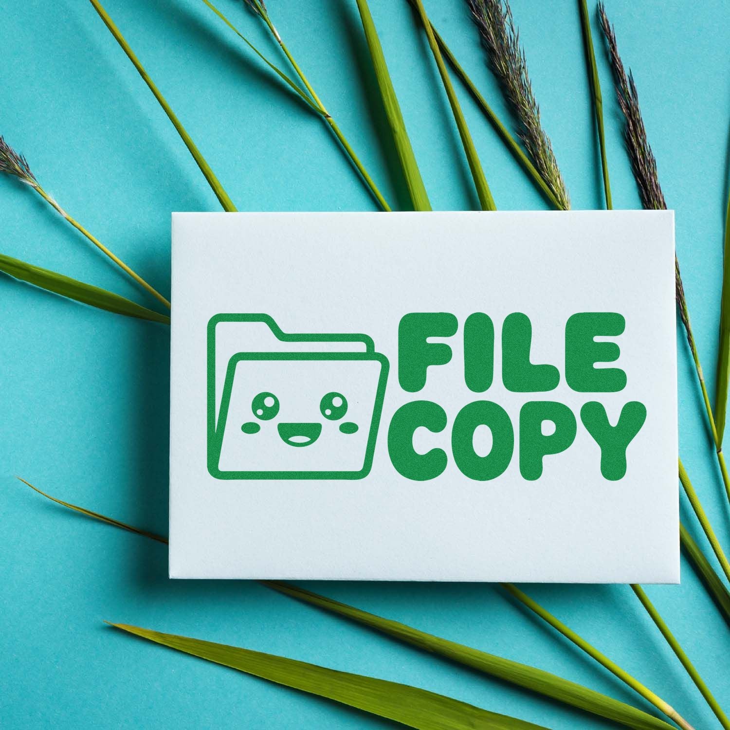 Green FILE COPY stamp and seal logo on white card, with folder icon, on a turquoise background with grass stems.