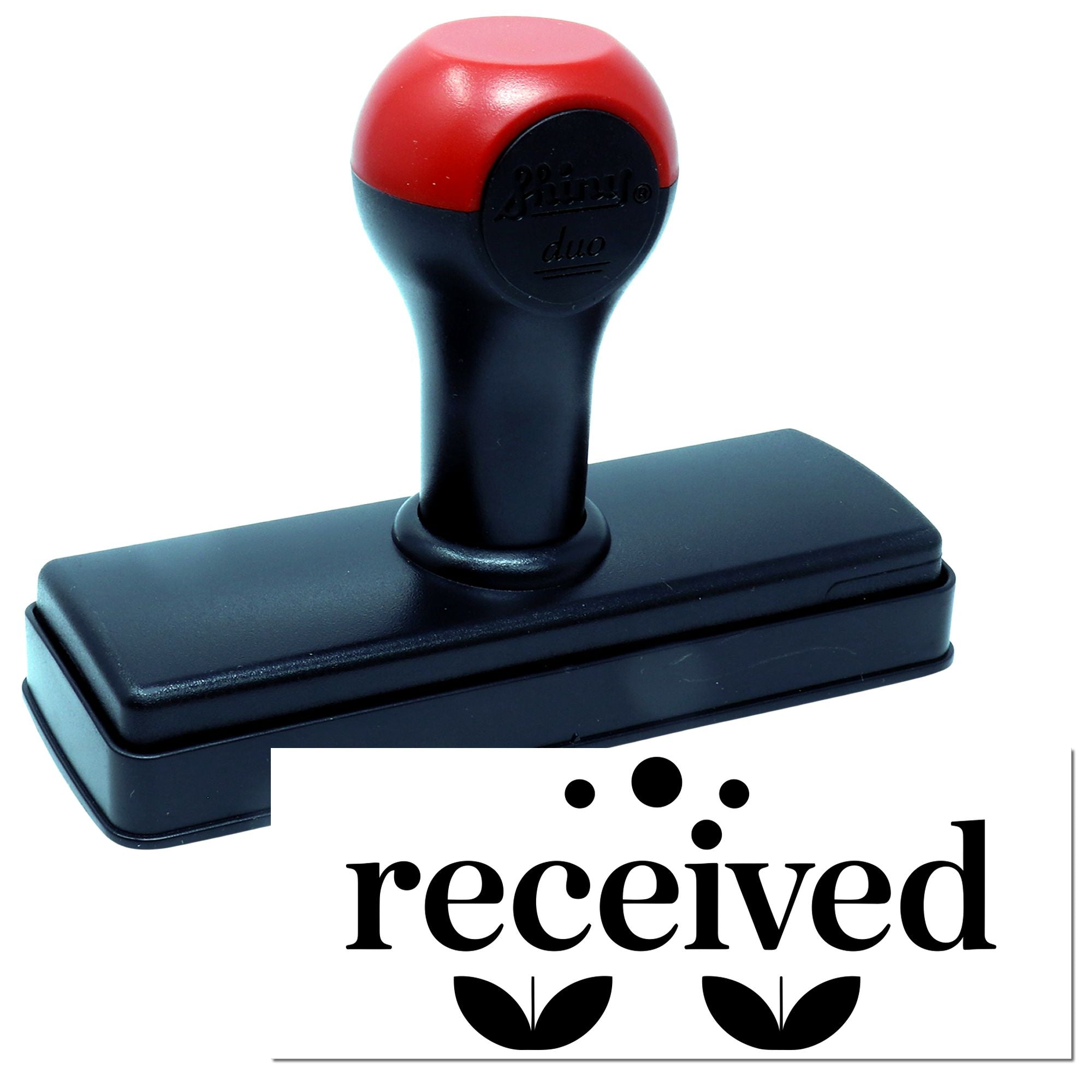 Red and black self-inking received stamp with black seal handle and printed received logo.