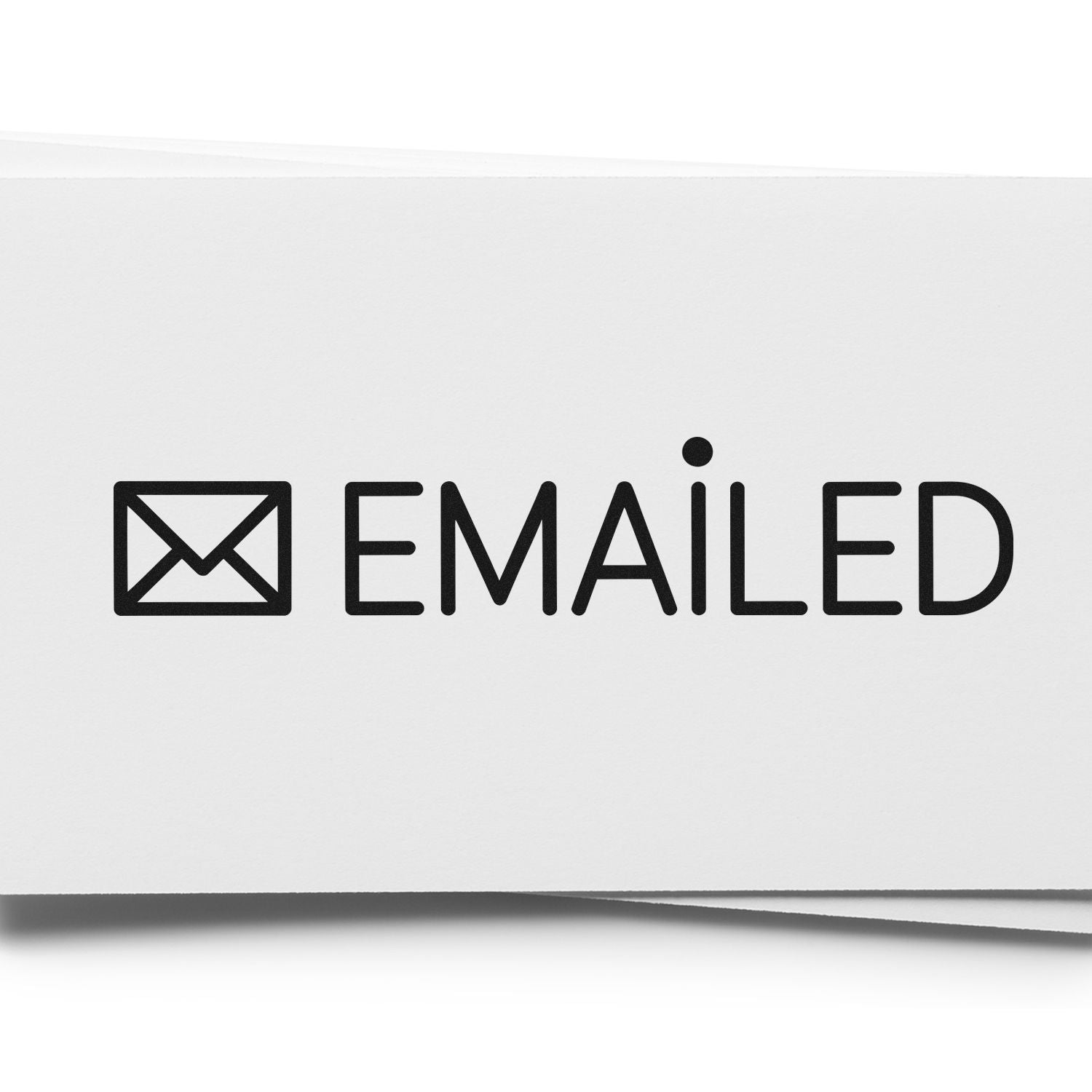 Black EMAILED stamp with envelope icon on white paper, a clear mail seal marking.