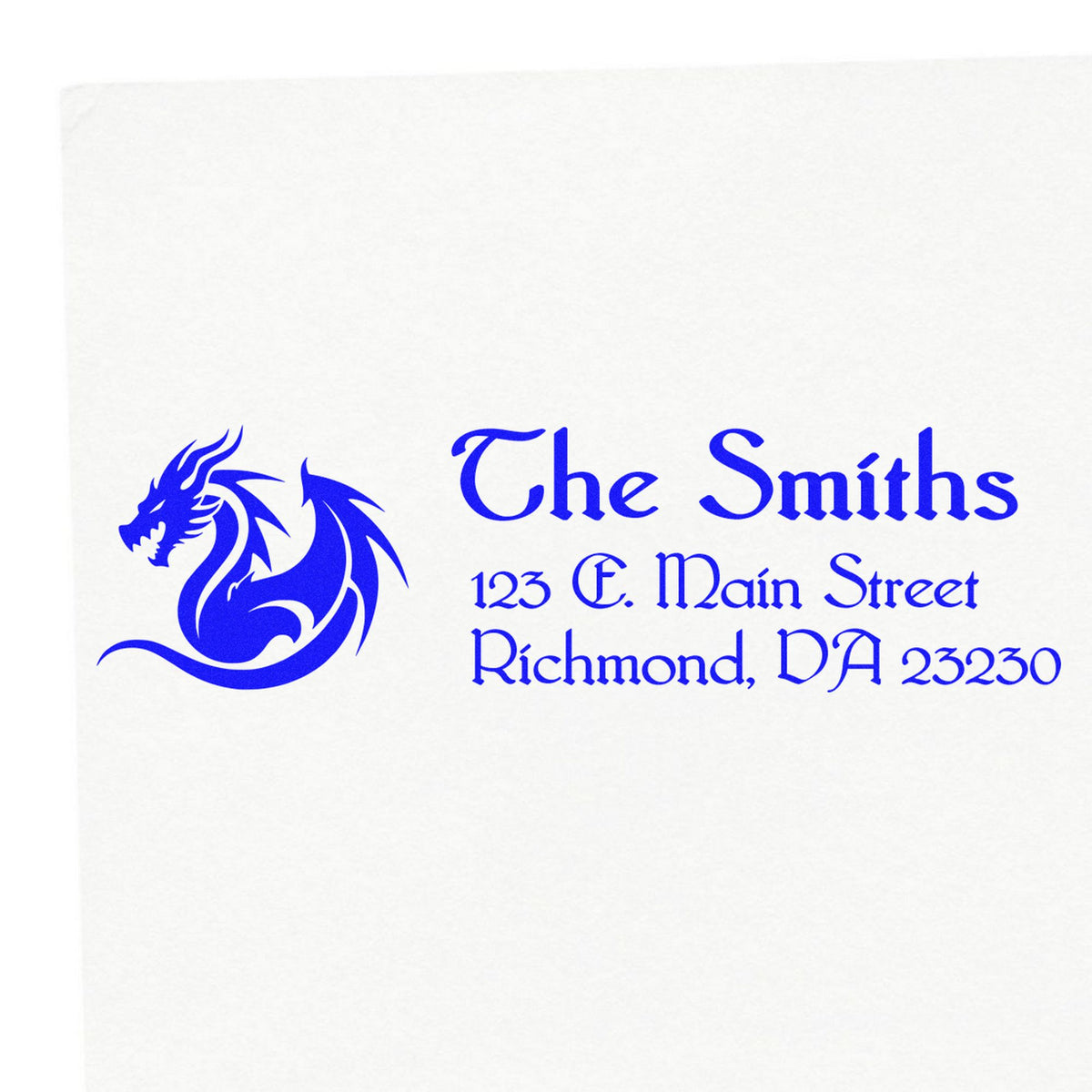 Blue custom stamp and seal with dragon logo, The Smiths, and address on white background.
