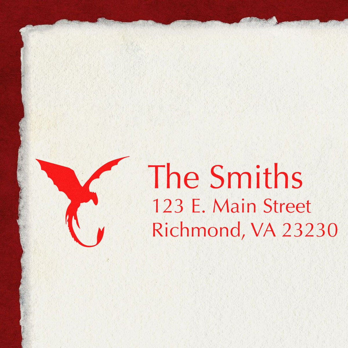 White textured stamp paper with red eagle seal and address for The Smiths on a deep red background.