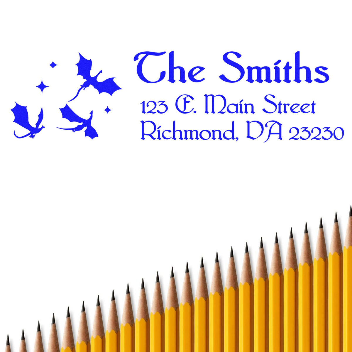 Blue custom address stamp and seal design with dragon, stars, and The Smiths address; pencils lined along the bottom edge.