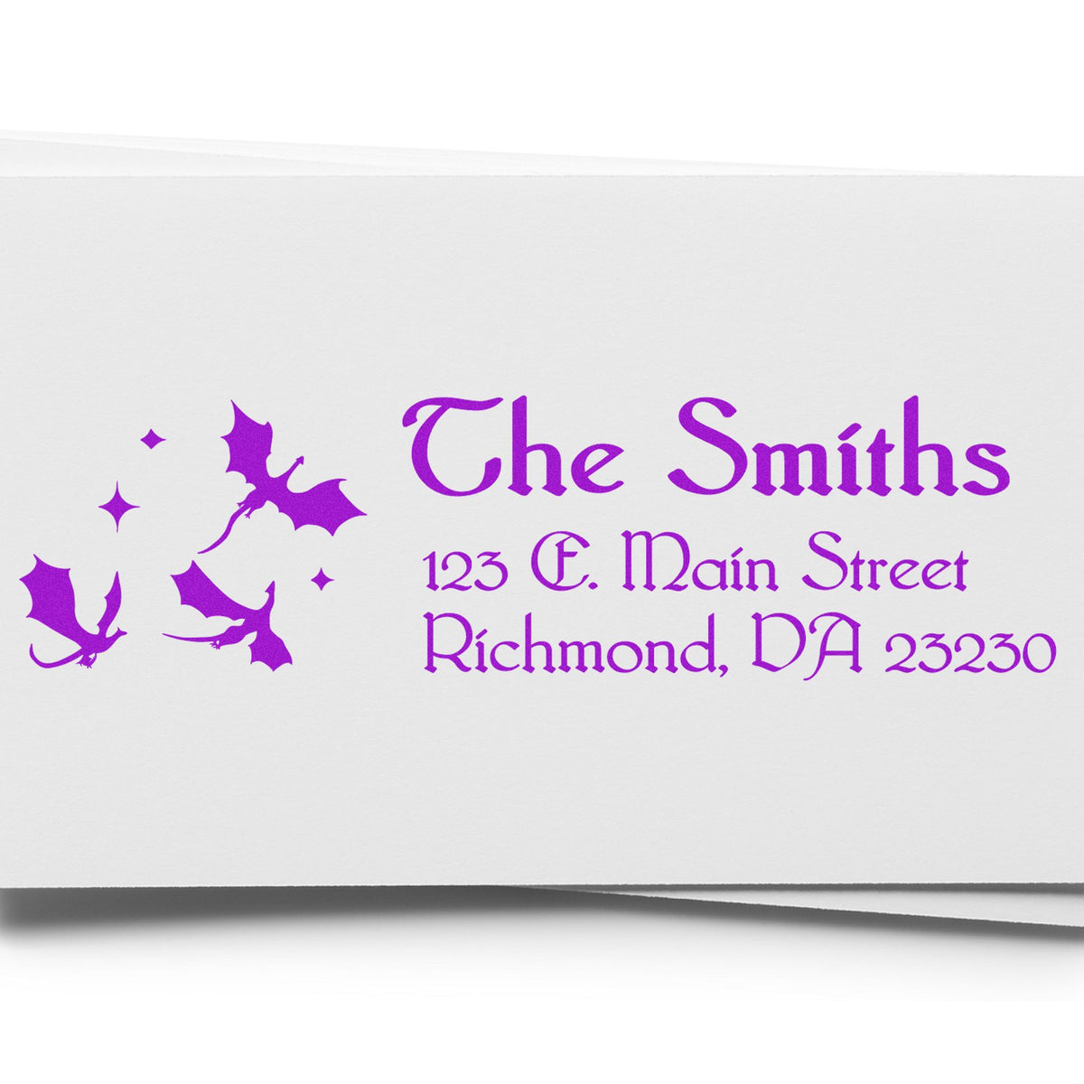 Purple custom stamp/seal with bat silhouettes for The Smiths, 123 E. Main Street, Richmond, VA 23230 on white paper.
