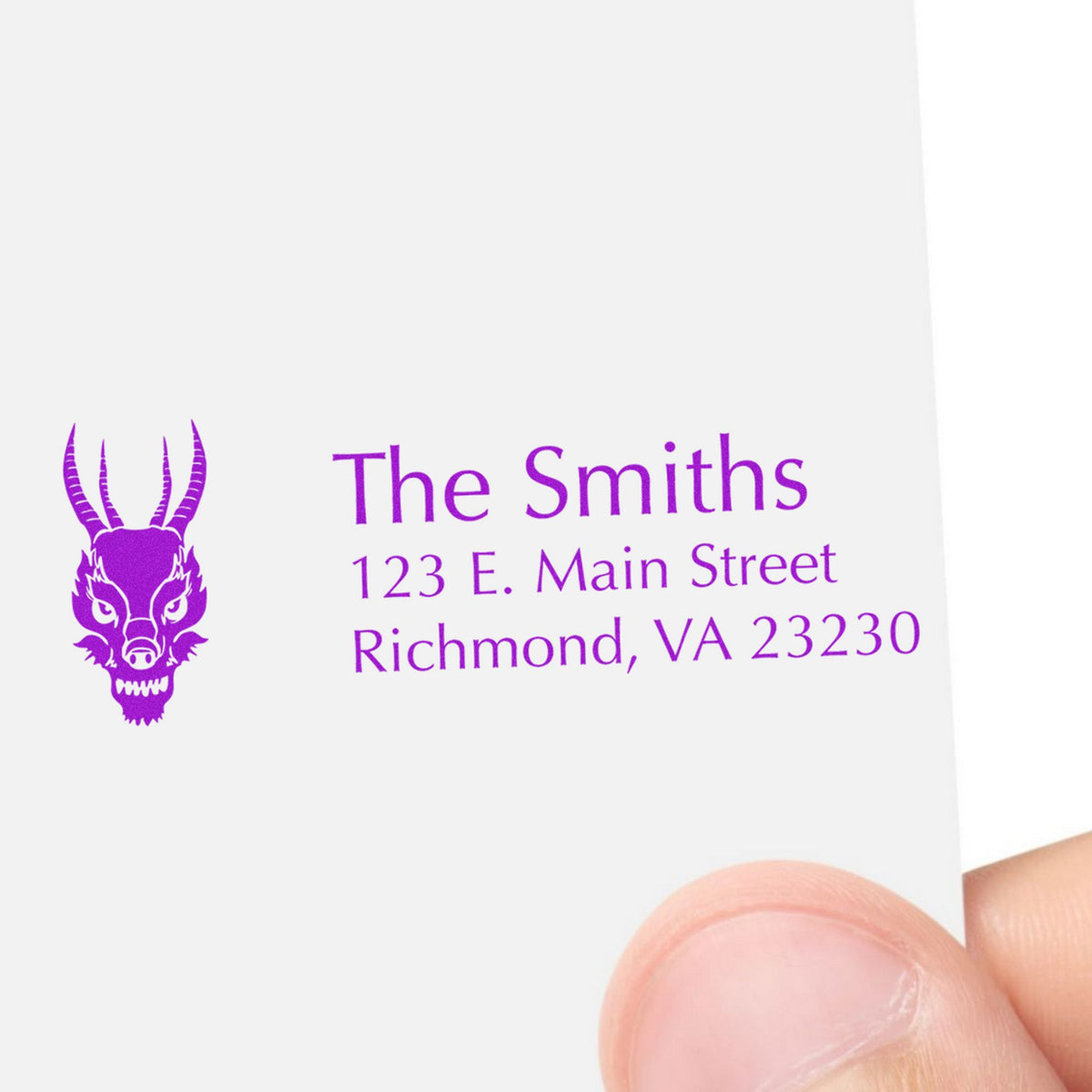 Purple custom address stamp with horned skull seal for The Smiths, 123 E. Main Street, Richmond, VA 23230