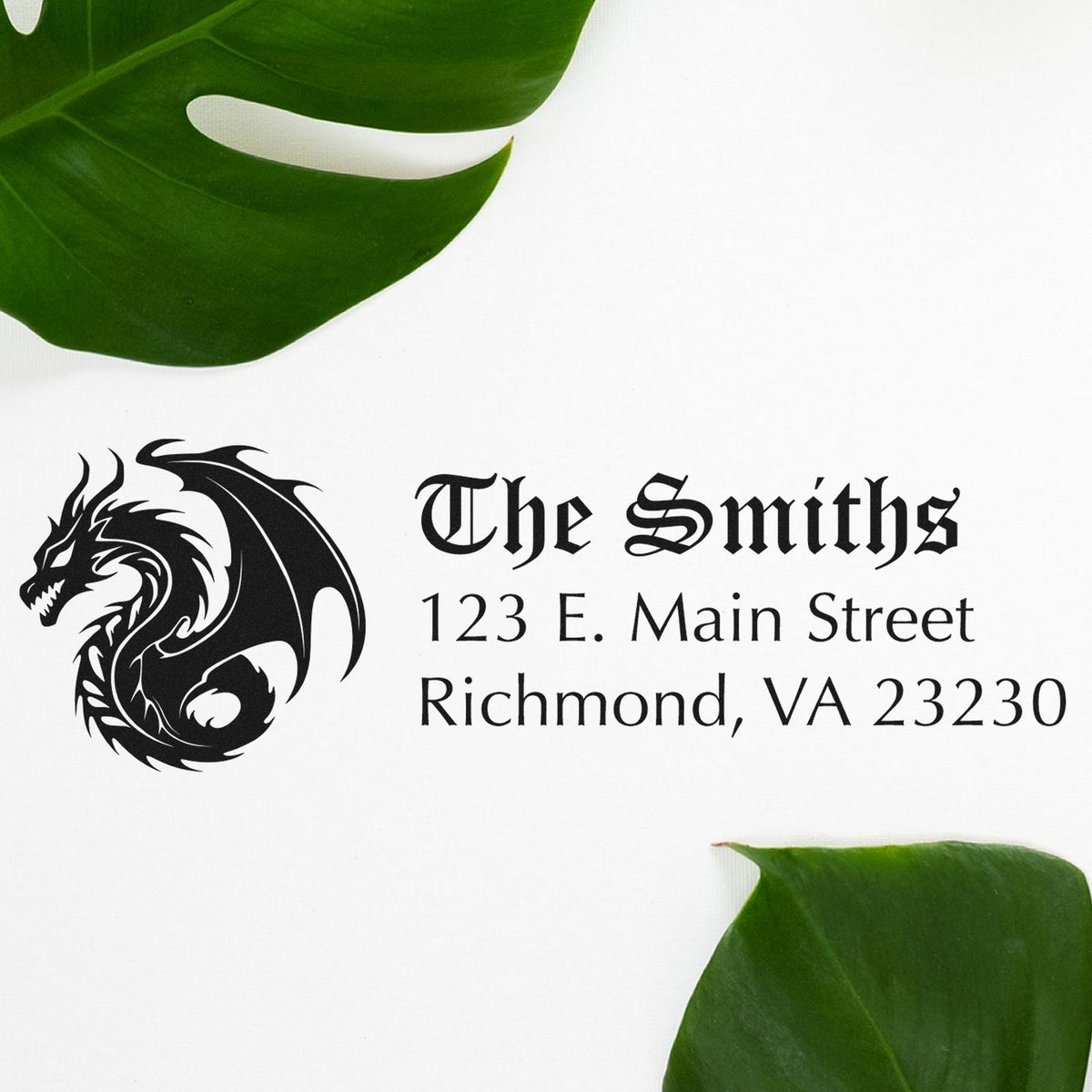 Custom stamp and seal with black dragon logo, The Smiths address, and green leaf accents on a white background.
