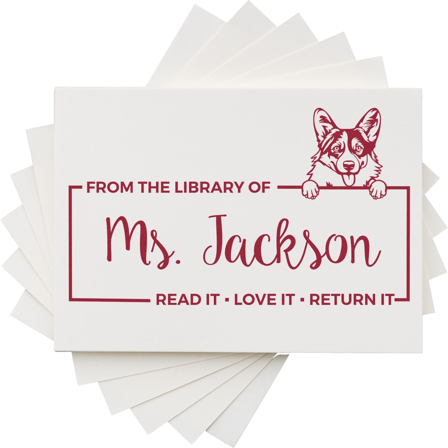 White custom library stamp cards with burgundy text, a corgi seal, and Ms. Jackson read-it-love-it-return-it design.