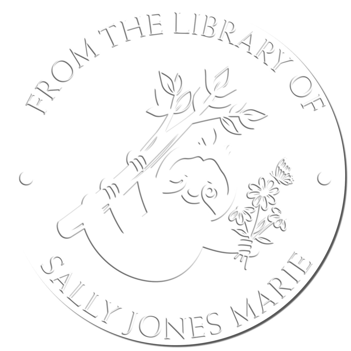 White embossed round library seal stamp with owl, leafy branch, flowers, and curved text for Sally Jones Marie.