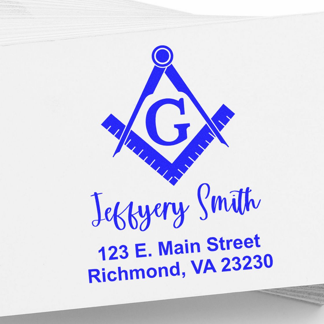 Blue custom business stamp and seal with compass logo, letter G, Jeffery Smith name, and Richmond, VA address.