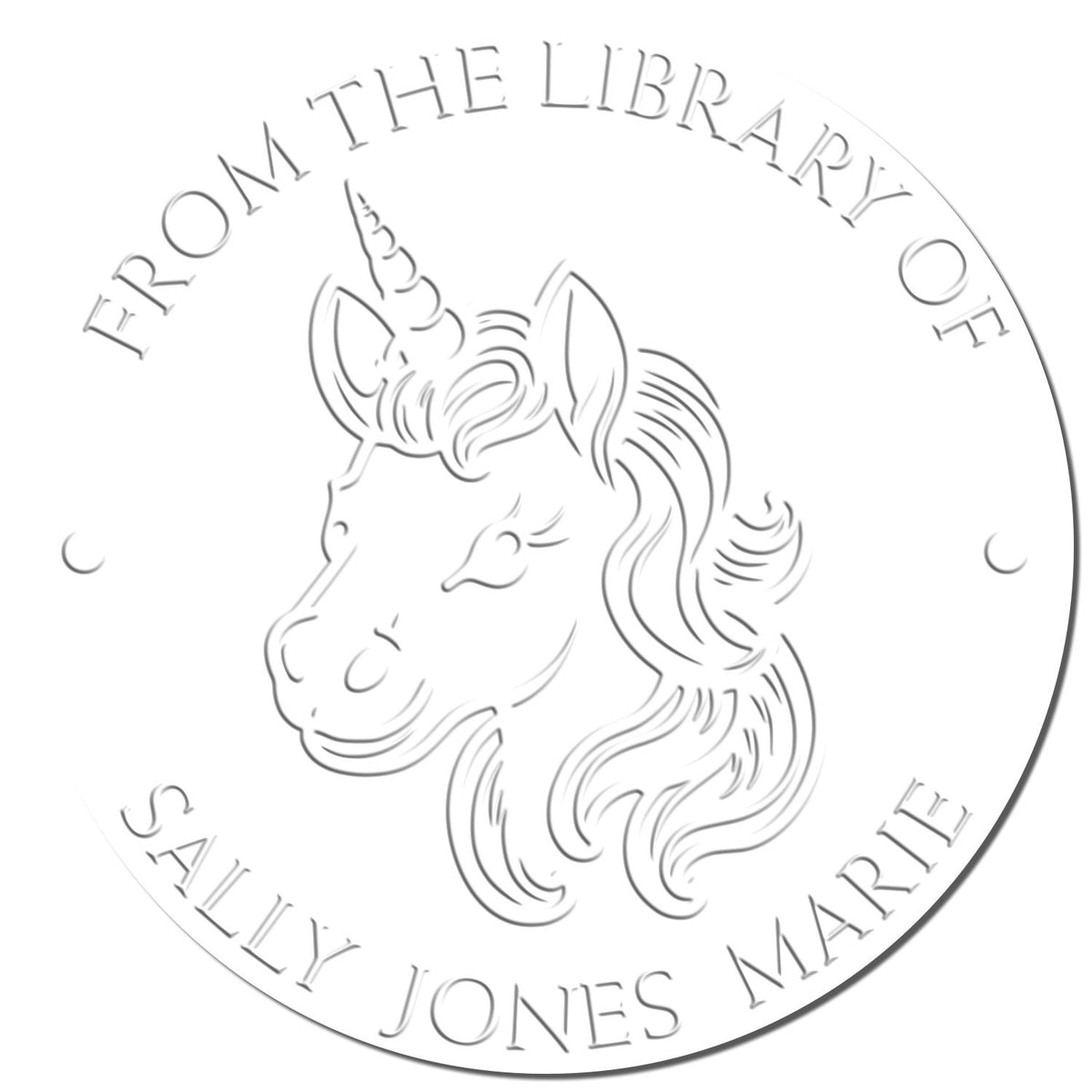 Circular silver embossed library stamp with unicorn head and text From the Library of Sally Jones Marie.