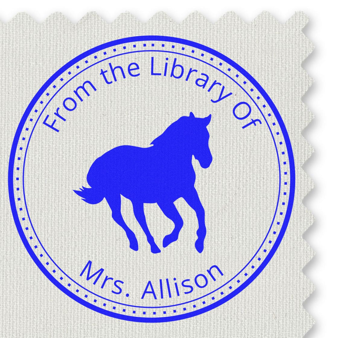 Blue circular library stamp seal with horse silhouette and From the Library of Mrs. Allison on textured white paper.