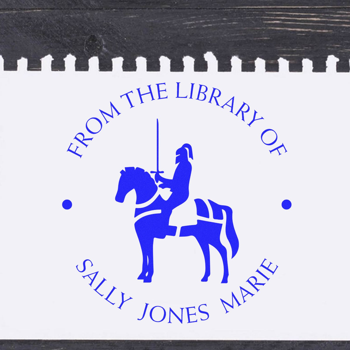 Blue custom library stamp seal with knight on horseback and circular text for Sally Jones Marie.