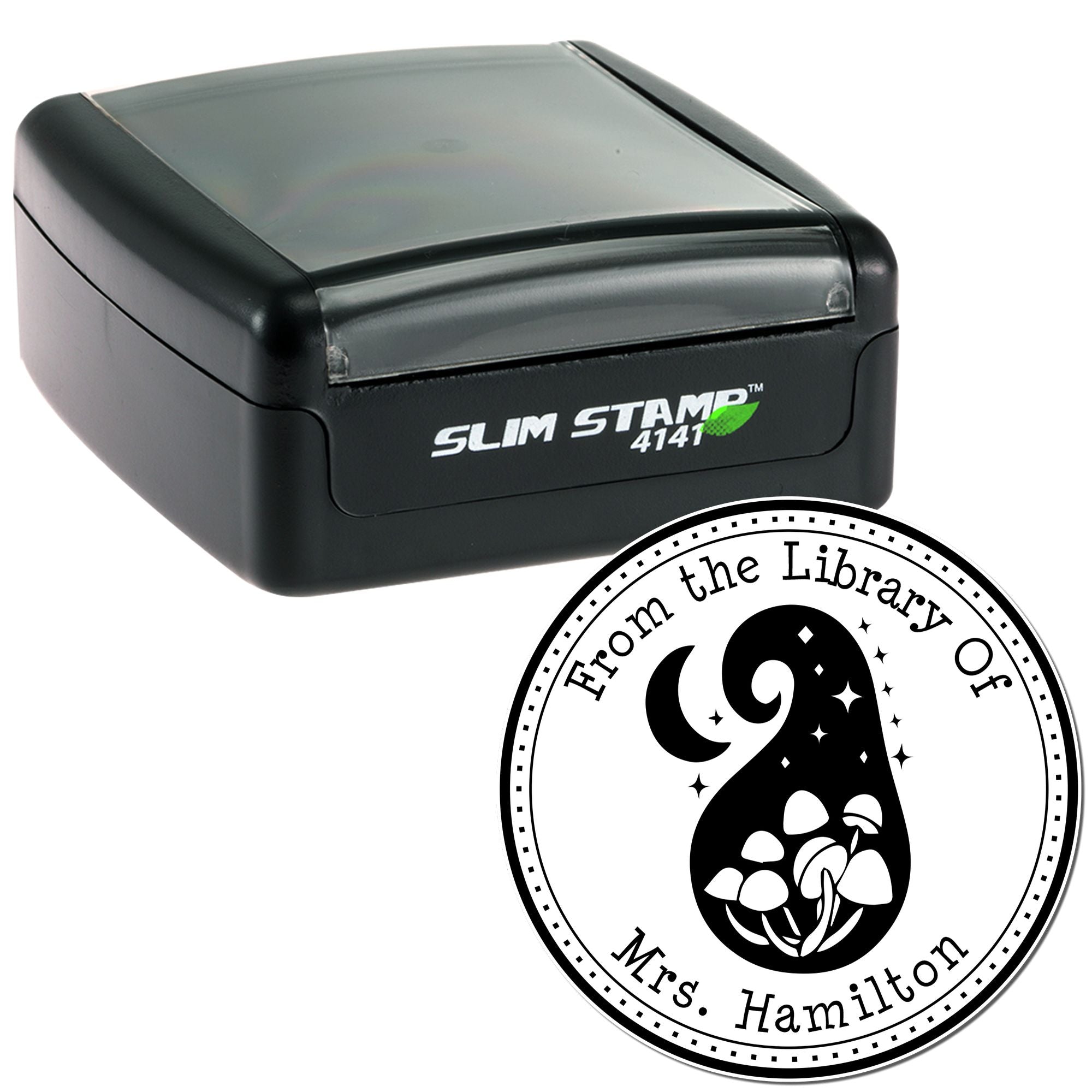 Black self-inking stamp and circular white library seal with floral design and Mrs. Hamilton text
