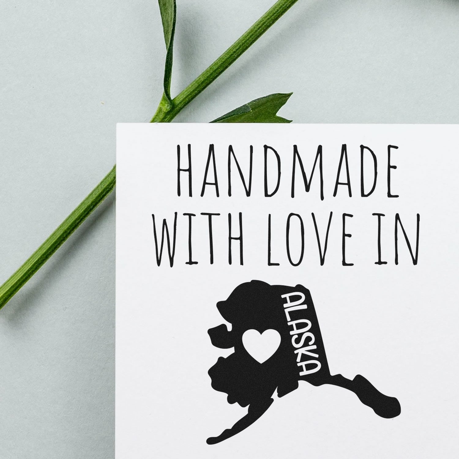 Self-Inking Alaska Handmade with Love Stamp featuring a map of Alaska and heart design, perfect for crafts and gifts.