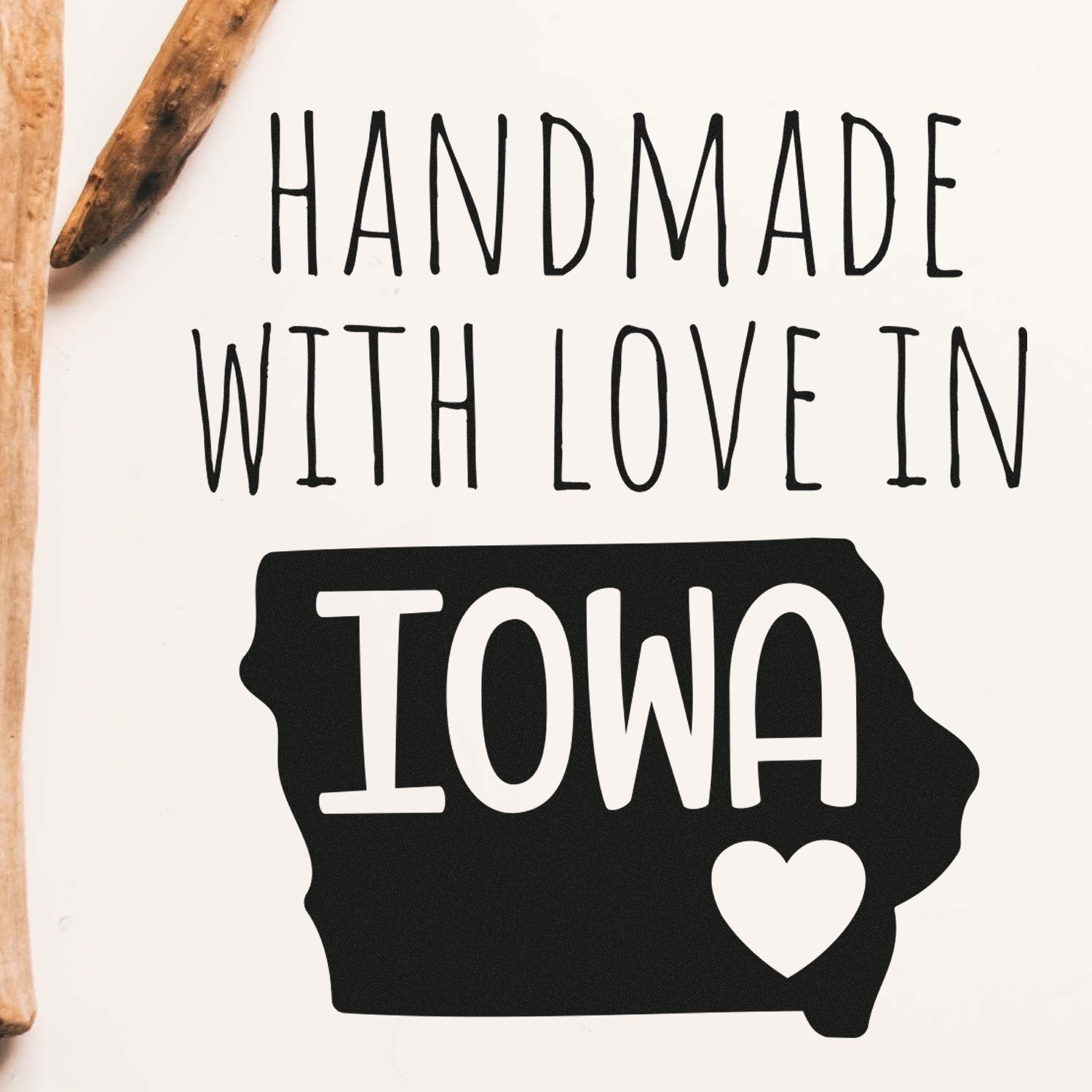 Wood Handle Iowa Handmade with Love Rubber Stamp featuring a map of Iowa with a heart, showcasing 'Handmade with Love in Iowa' text. Perfect for crafts and personalized projects.