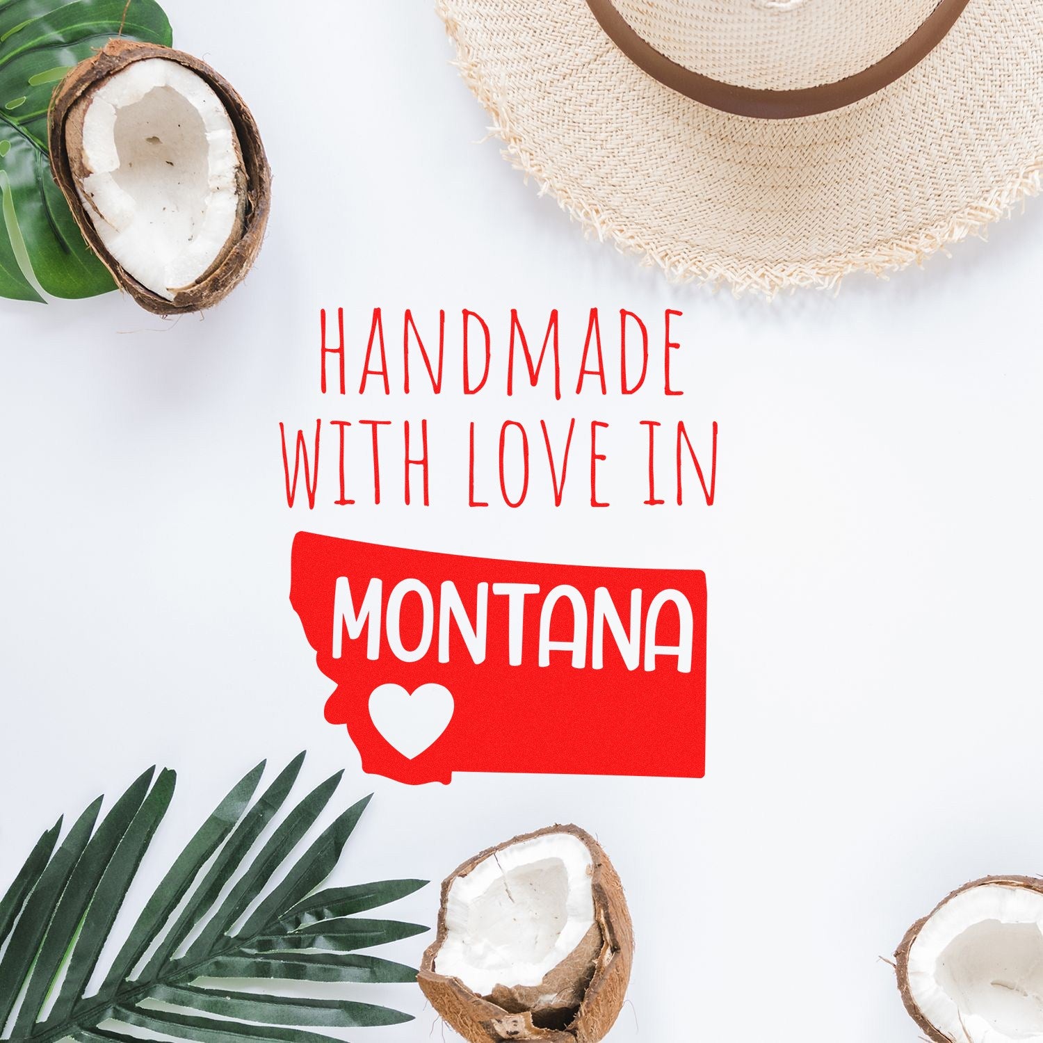 Wood Handle Montana Handmade with Love Rubber Stamp on a white background, surrounded by tropical leaves and coconut halves, featuring red text and a heart shape.