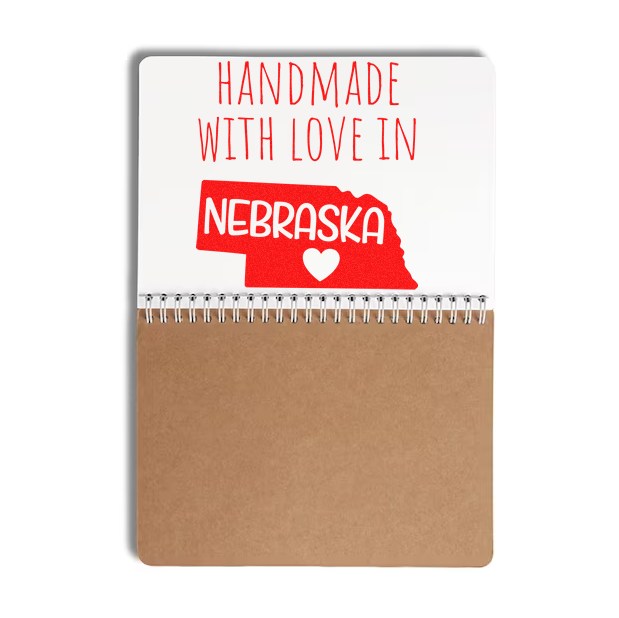 Self-Inking Nebraska Handmade with Love Stamp featuring a red Nebraska state outline and heart, perfect for adding a personal touch to crafts and gifts.