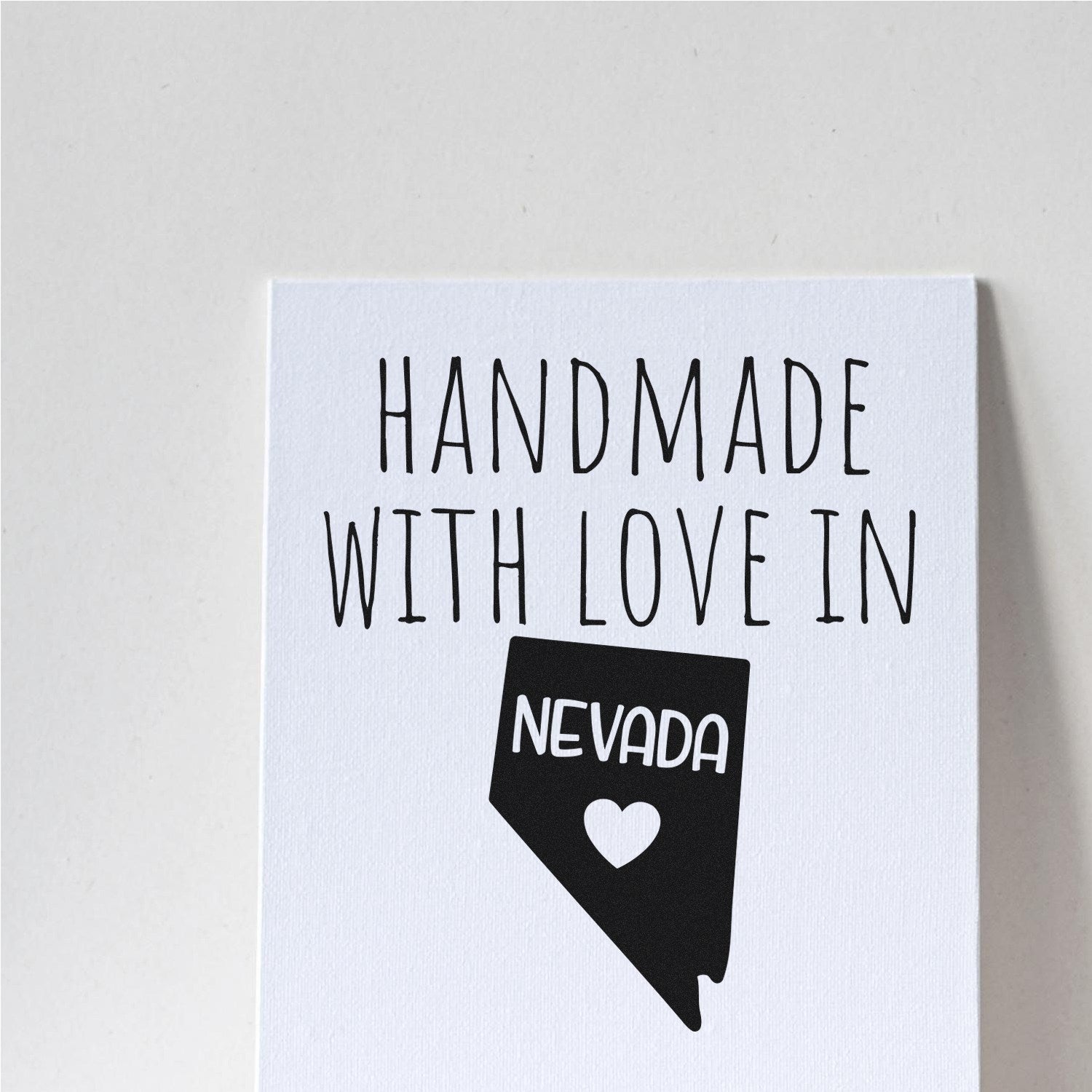 PSI Pre-Inked Handmade with Love in Nevada stamp on white background, featuring Nevada state outline and heart design.