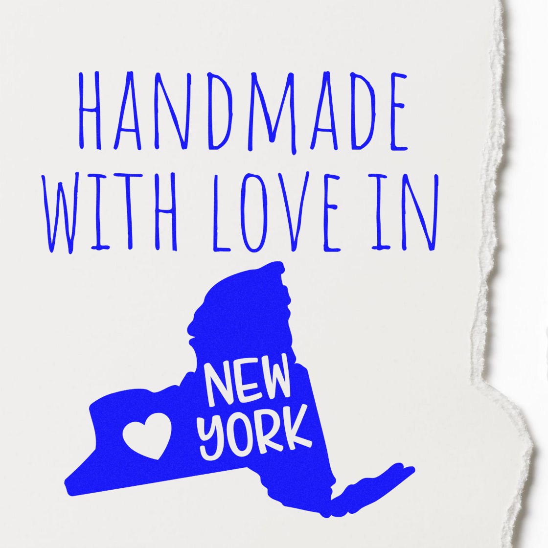 Handmade with Love in New York Slim Pre-Inked Stamp featuring a blue New York state outline with a heart, perfect for crafts and gifts.