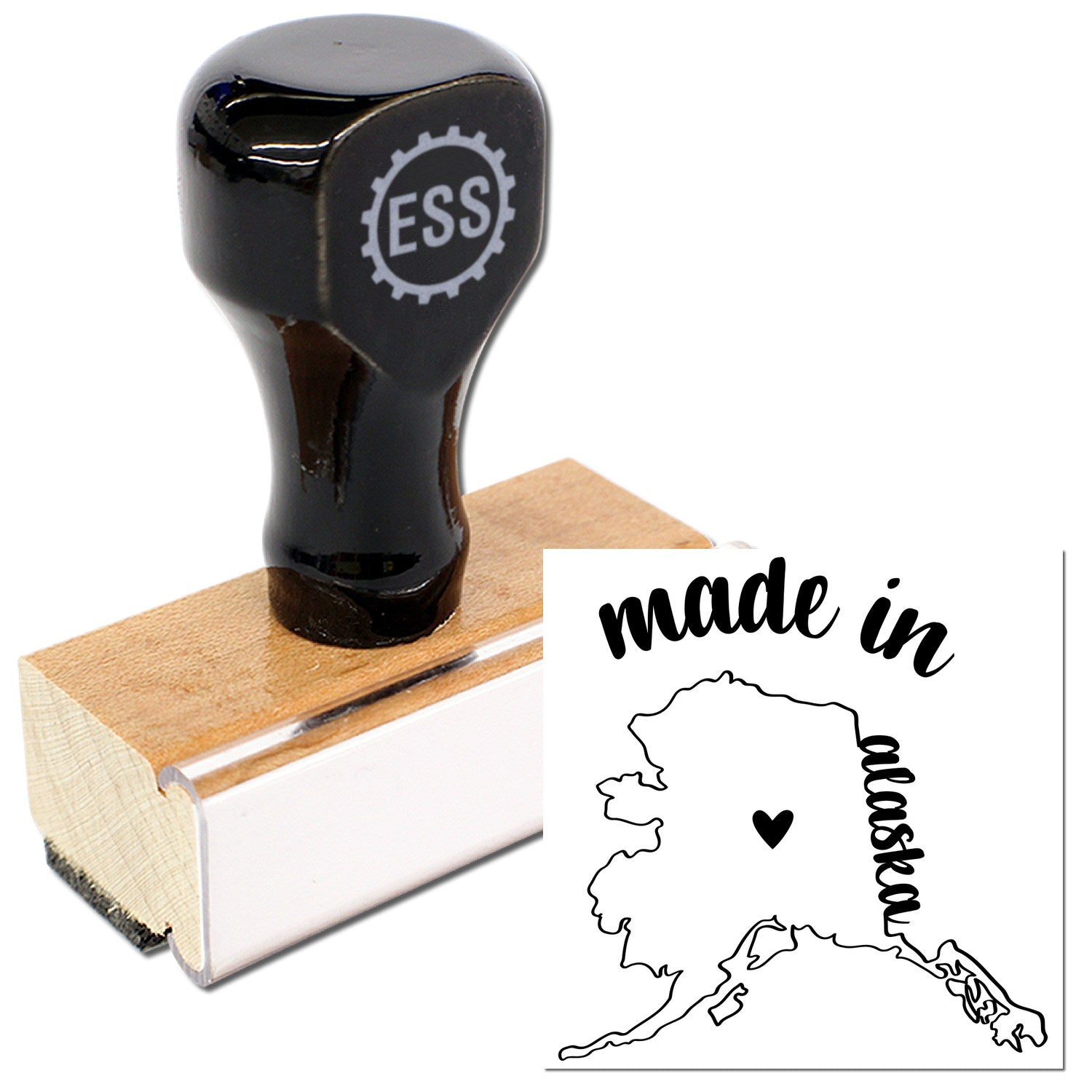 Made with Love in Alaska Rubber Stamp featuring a wooden handle and black rubber design with 'made in Alaska' text and state outline. Perfect for crafts and personalized projects.