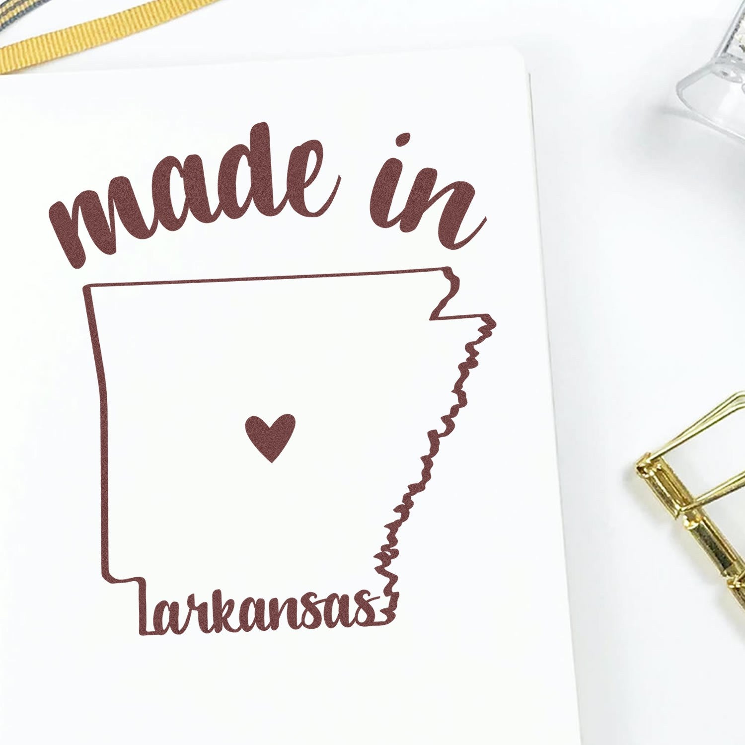 Slim Pre-Inked Stamp Arkansas Made in Stamp featuring a heart within the state outline, perfect for crafts and stationery.