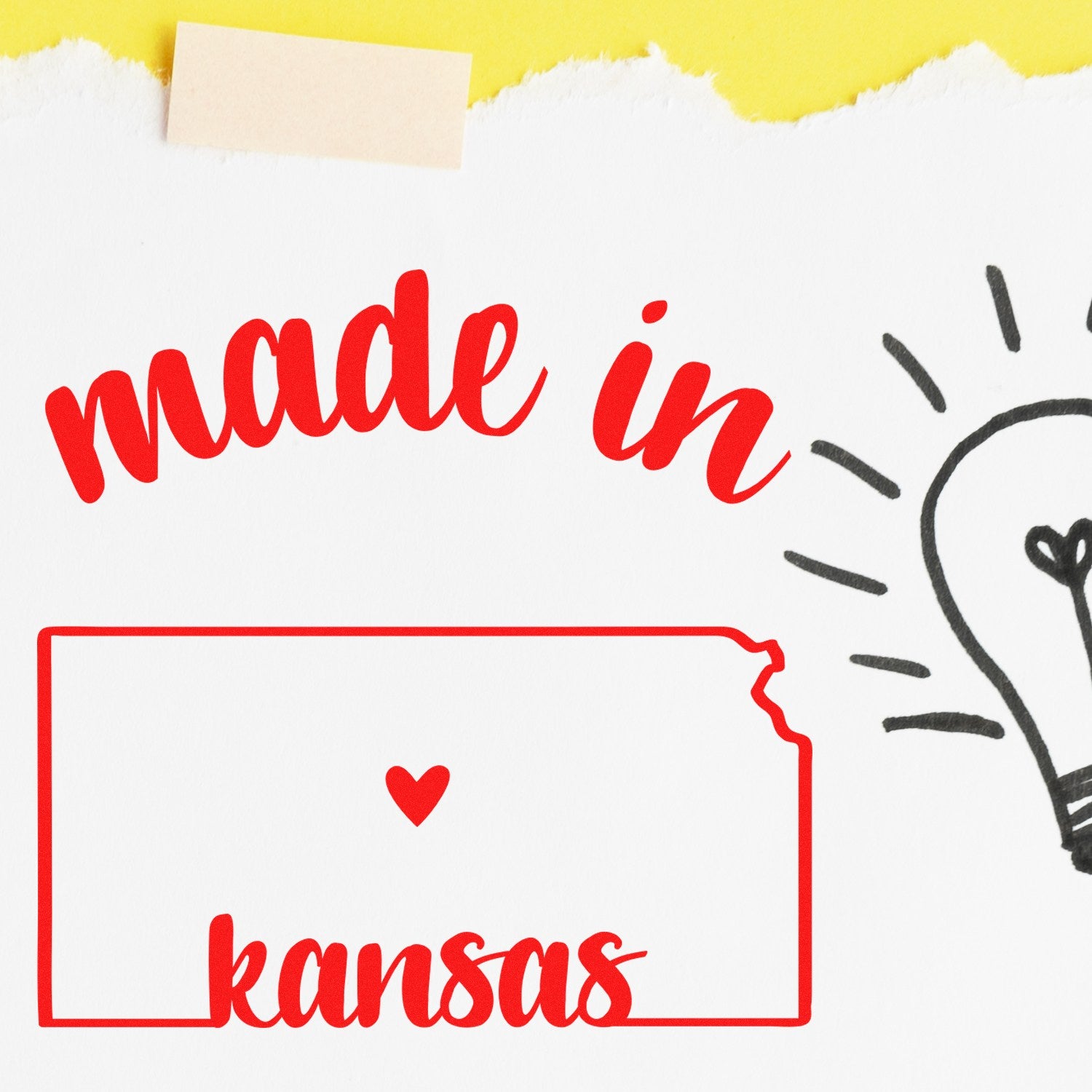 Slim Pre-Inked Stamp Kansas Made in Stamp featuring a red outline of Kansas with 'made in' and 'kansas' text, heart icon, and lightbulb sketch on a torn paper background.