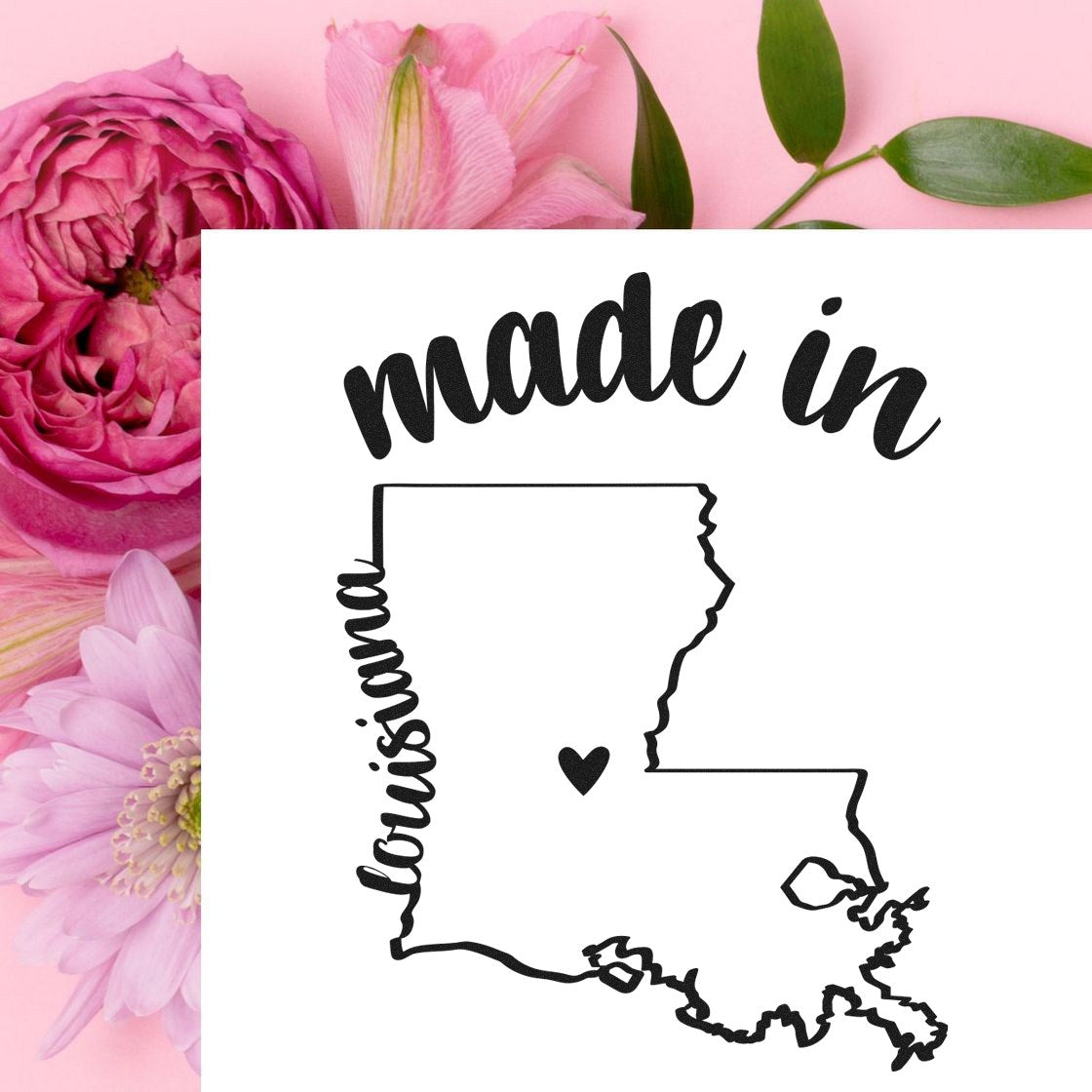 Made with Love in Louisiana Rubber Stamp featuring a heart inside the state outline, surrounded by pink flowers on a light background.