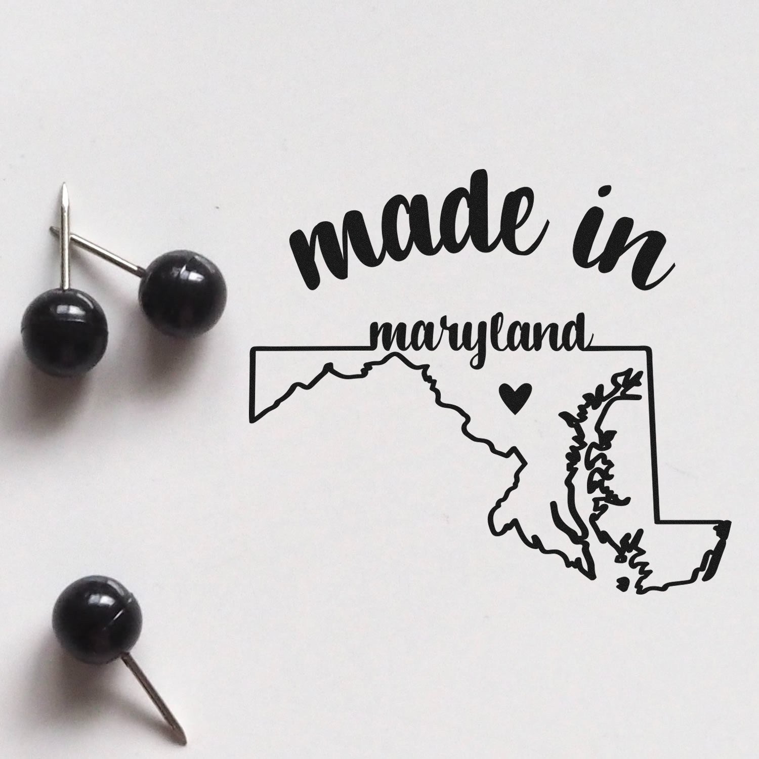 Slim Pre-Inked Stamp Maryland Made in Stamp featuring a black outline of Maryland with made in text, perfect for crafts and stationery.