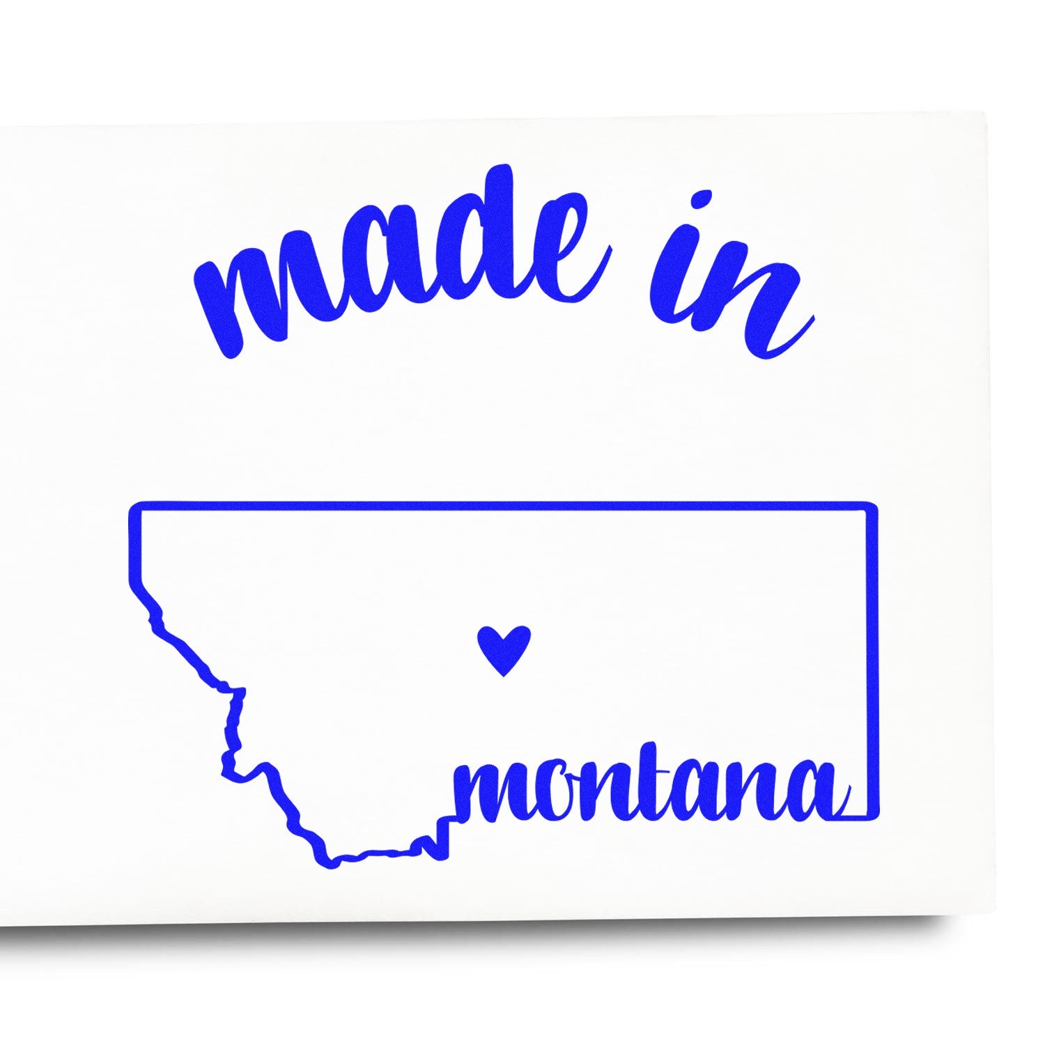 Made with Love in Montana Rubber Stamp featuring a blue outline of Montana with a heart, and the words 'made in montana' in stylish script.